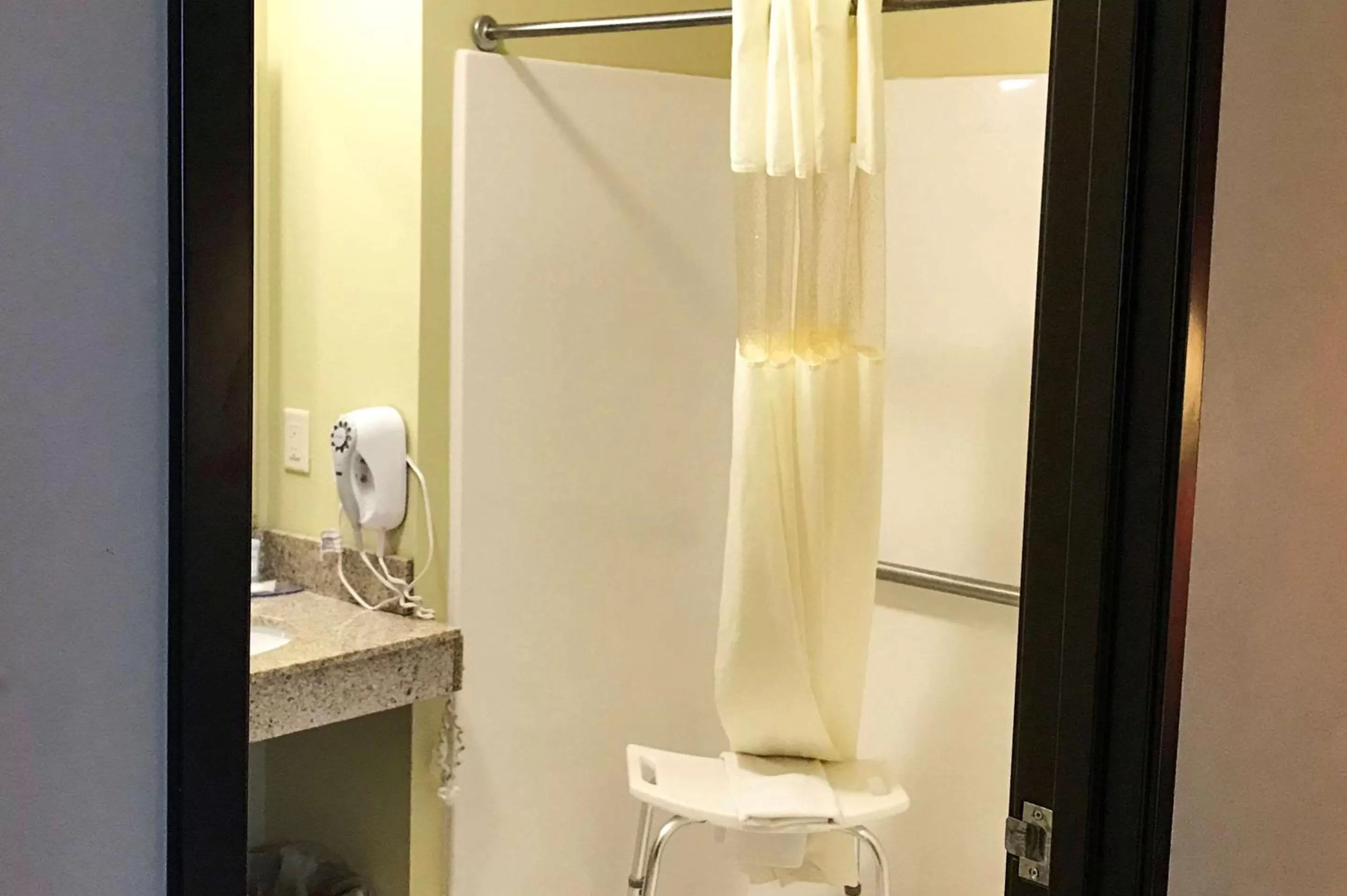 Bedroom in Suburban Studios Cedar Falls