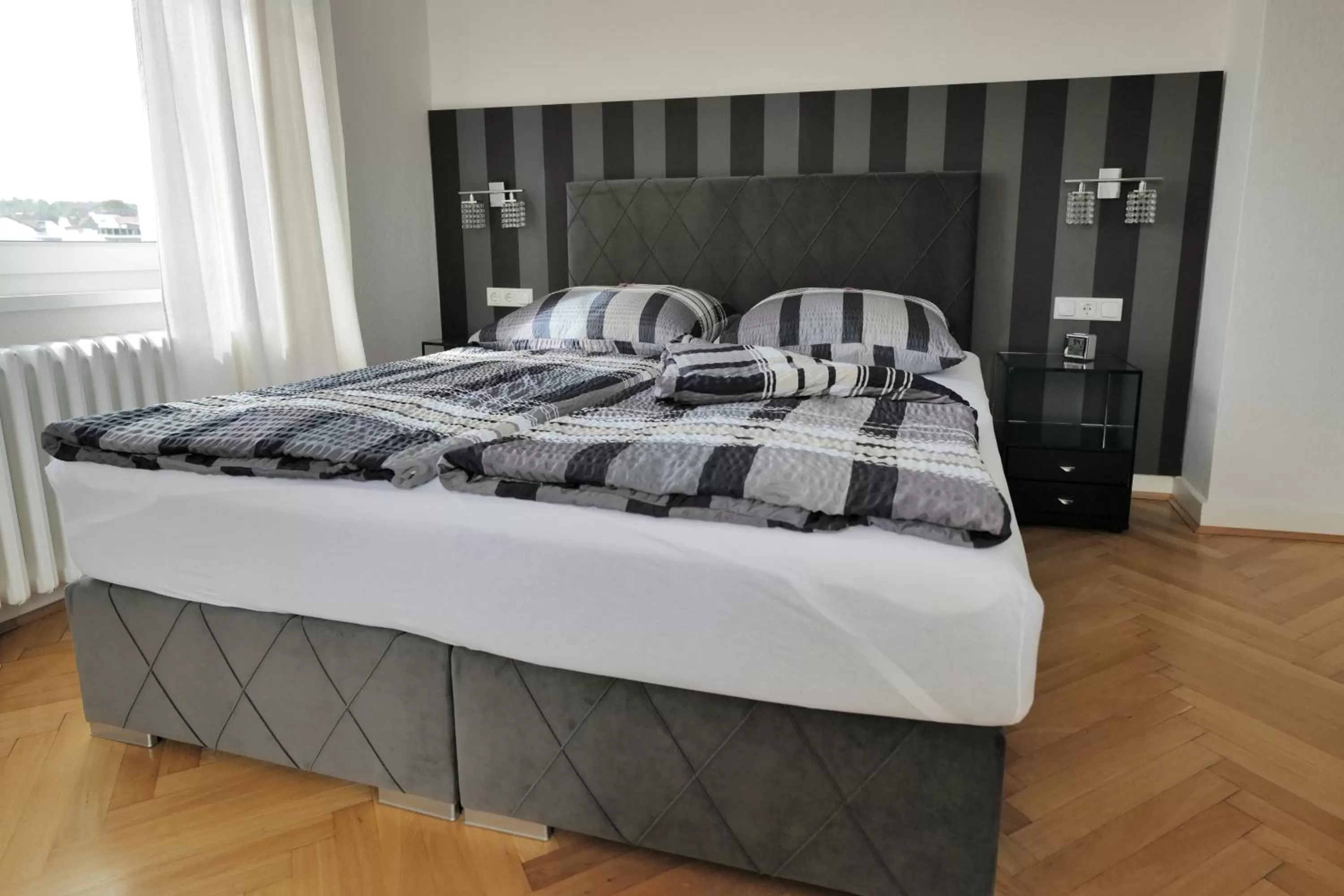 Bed in Elena Kempf Haaratelier & Guesthouse