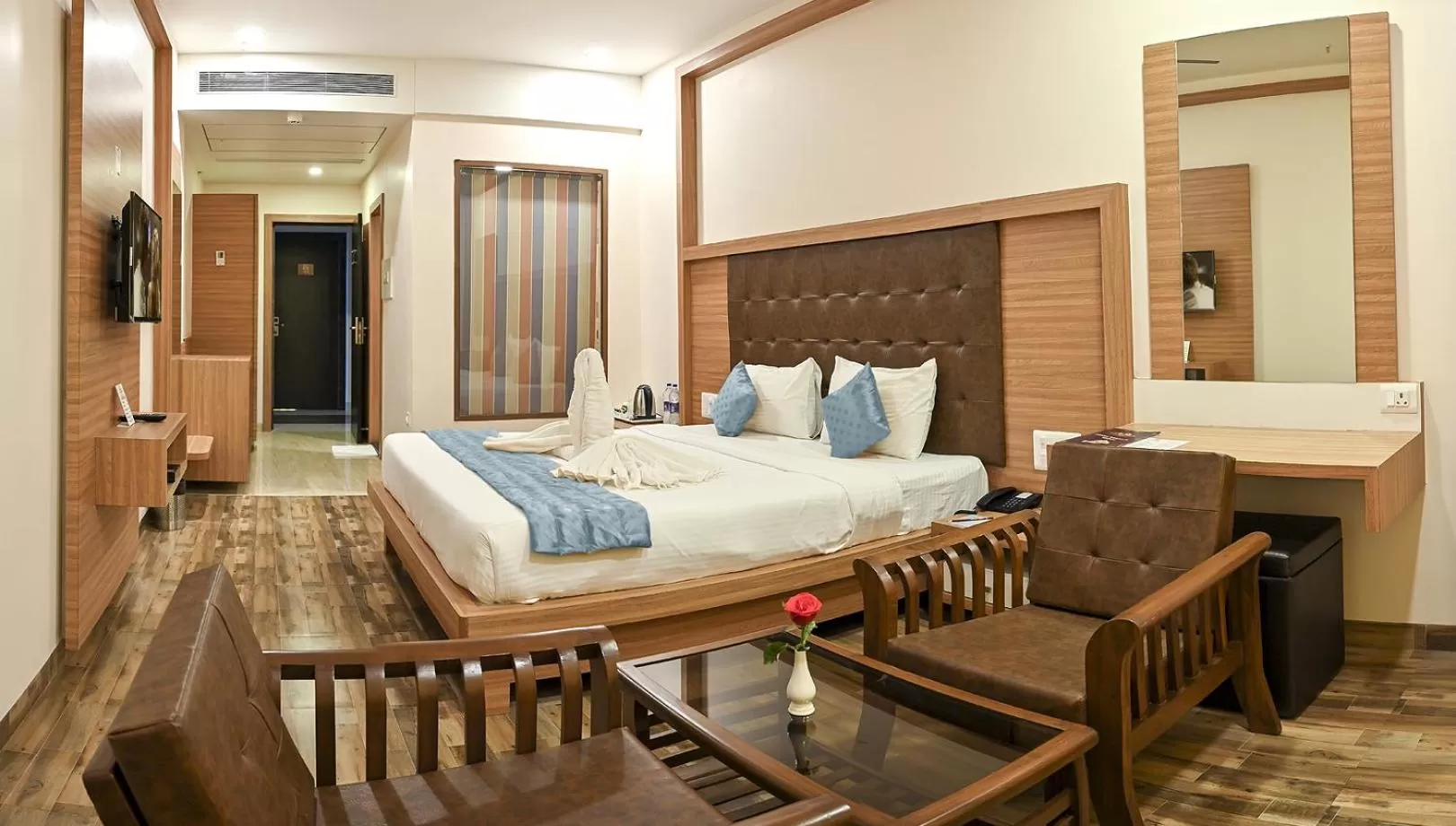 Bed in Hotel Laxmi Empire