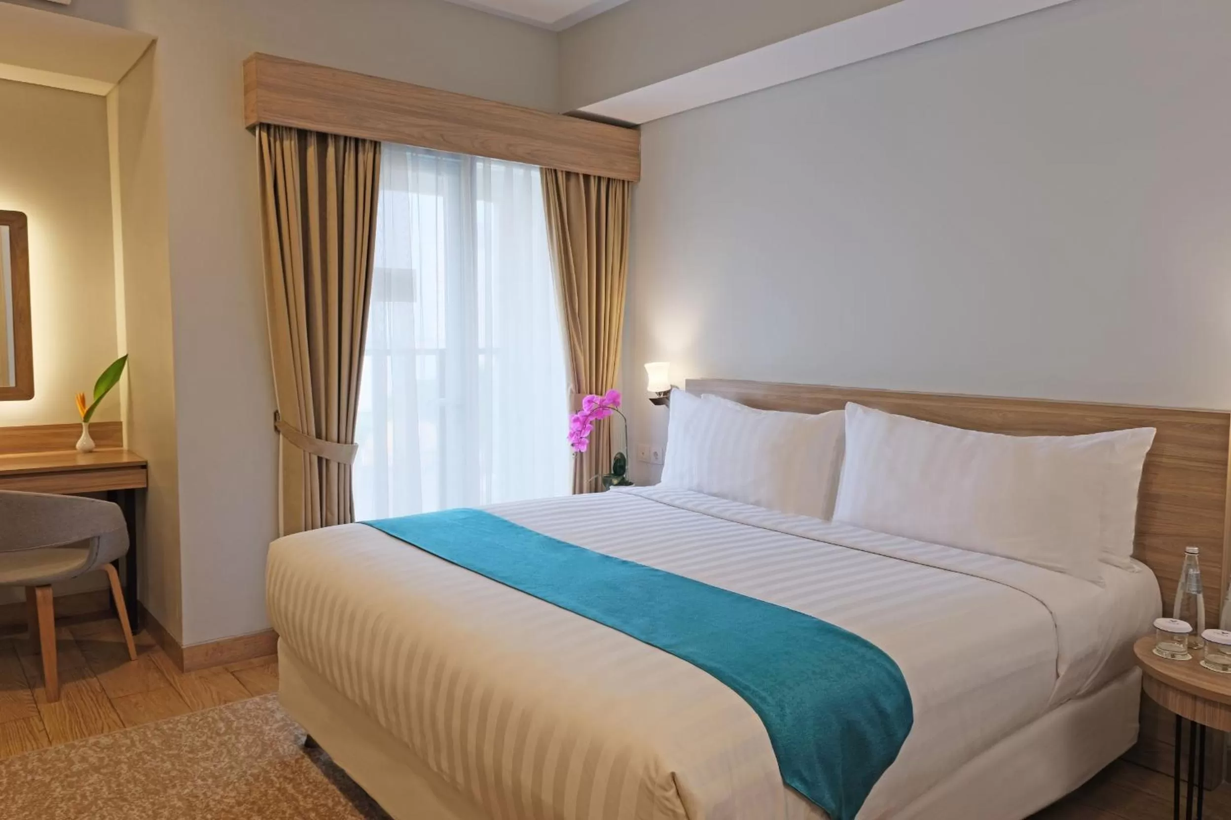 Deluxe Room (2 Adults + 1 Child) in Vega Hotel Gading Serpong
