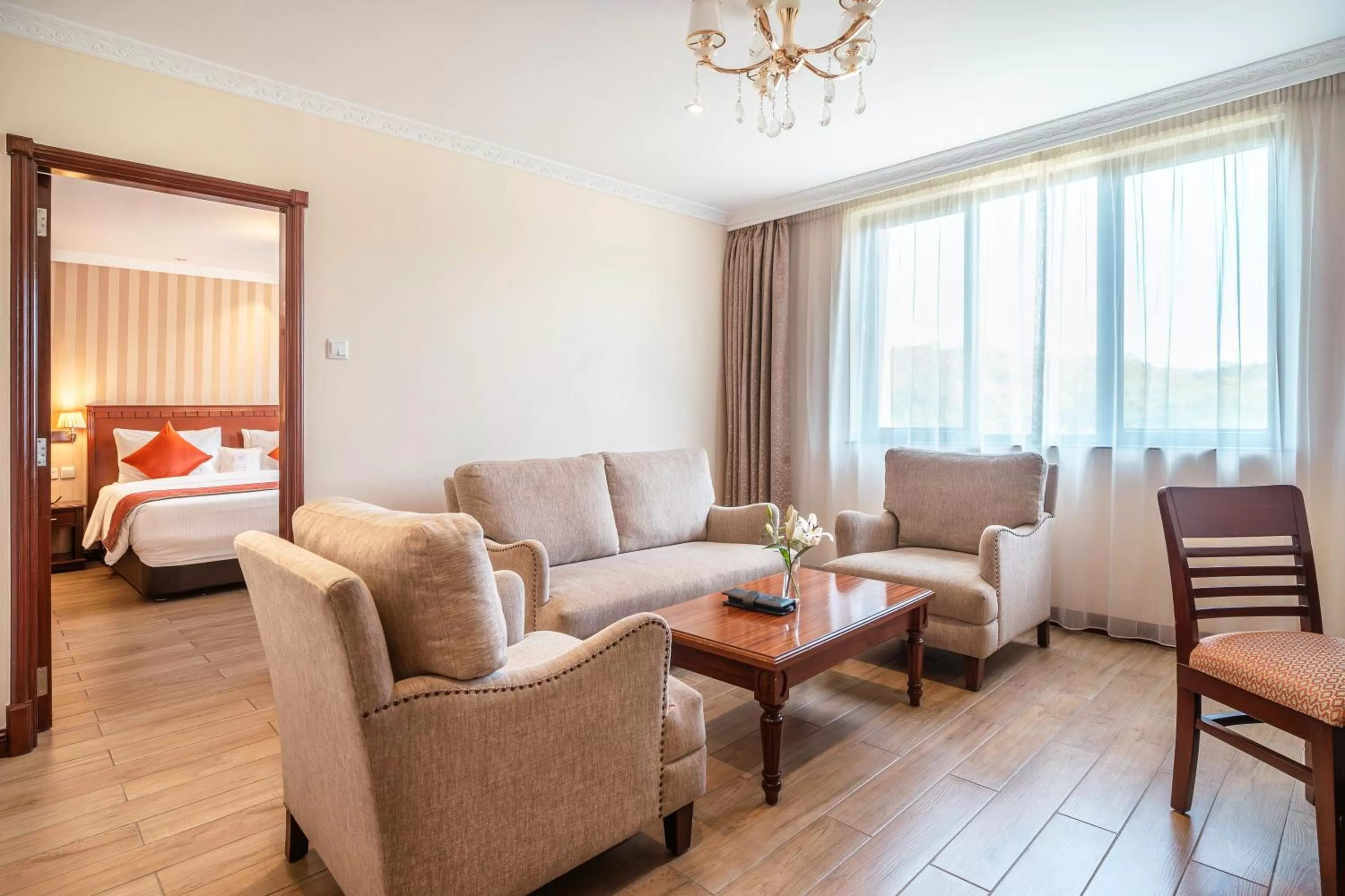 Seating area, Bed in Sarova Woodlands Hotel and Spa