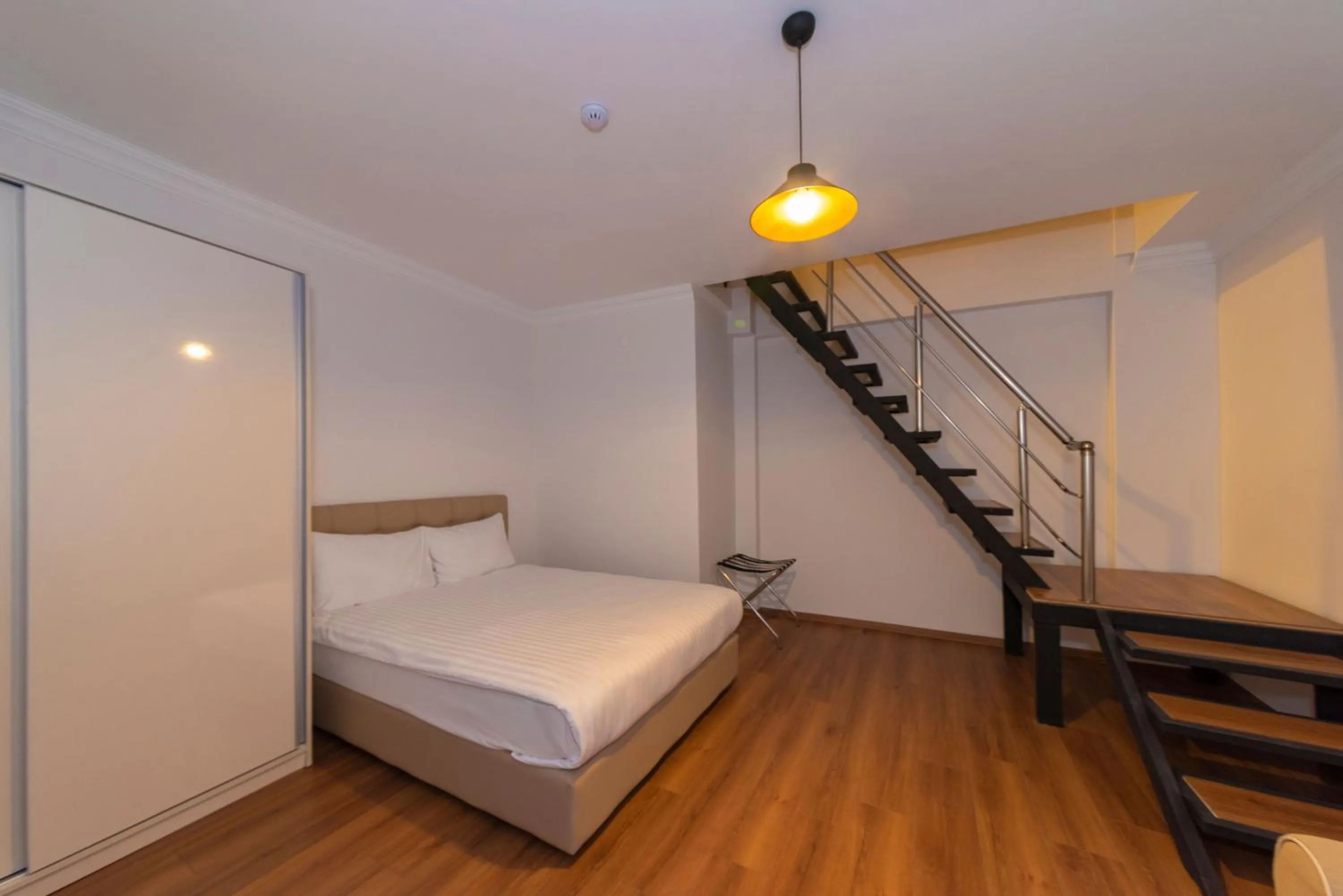 Bedroom, Bed in Joy Suites