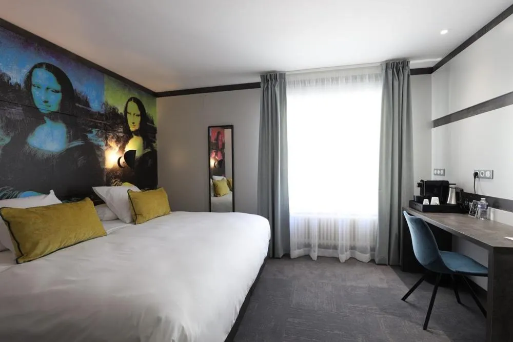 Bed in Hôtel la Capelle Millau