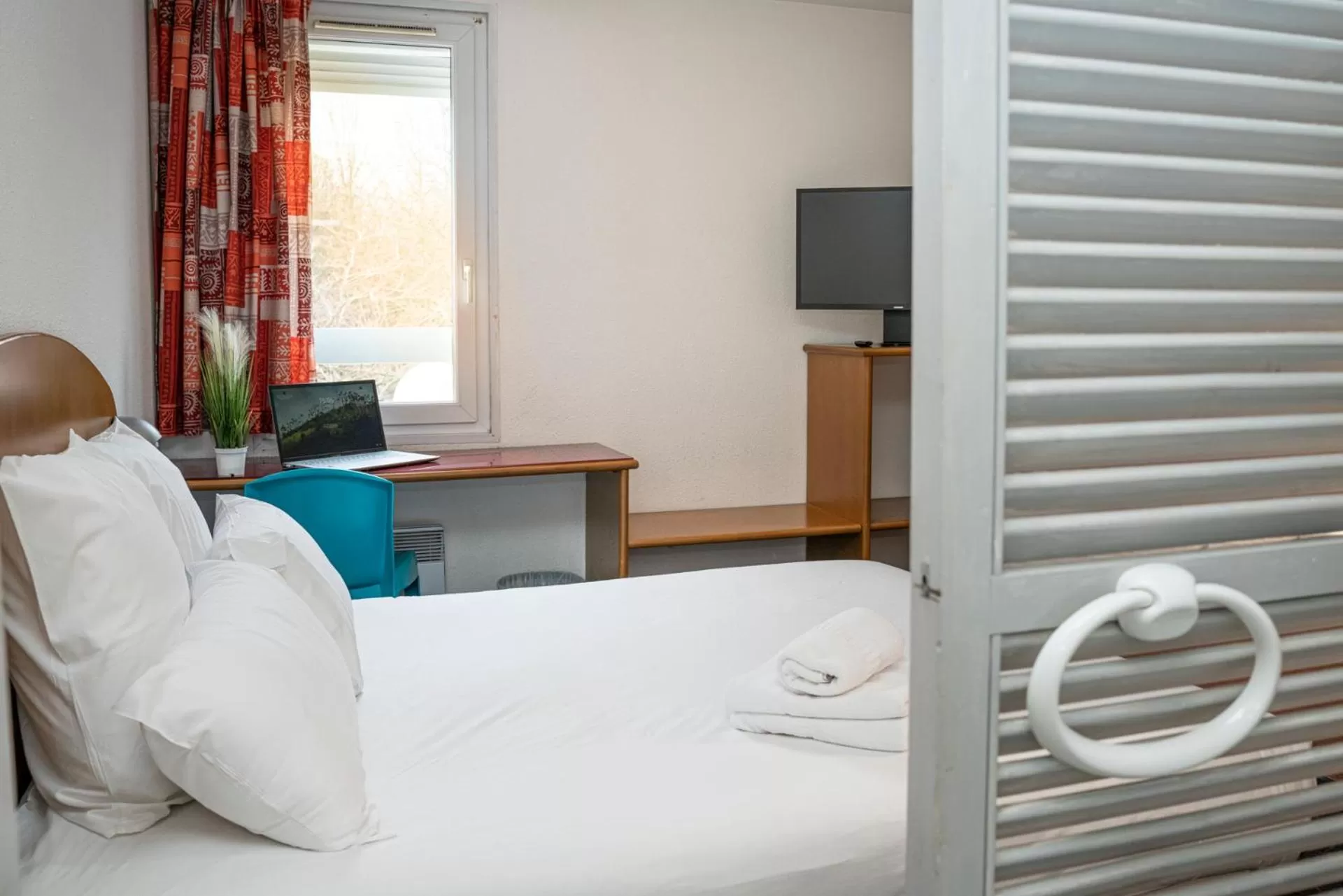 Bed in Quick Palace Pau Zénith