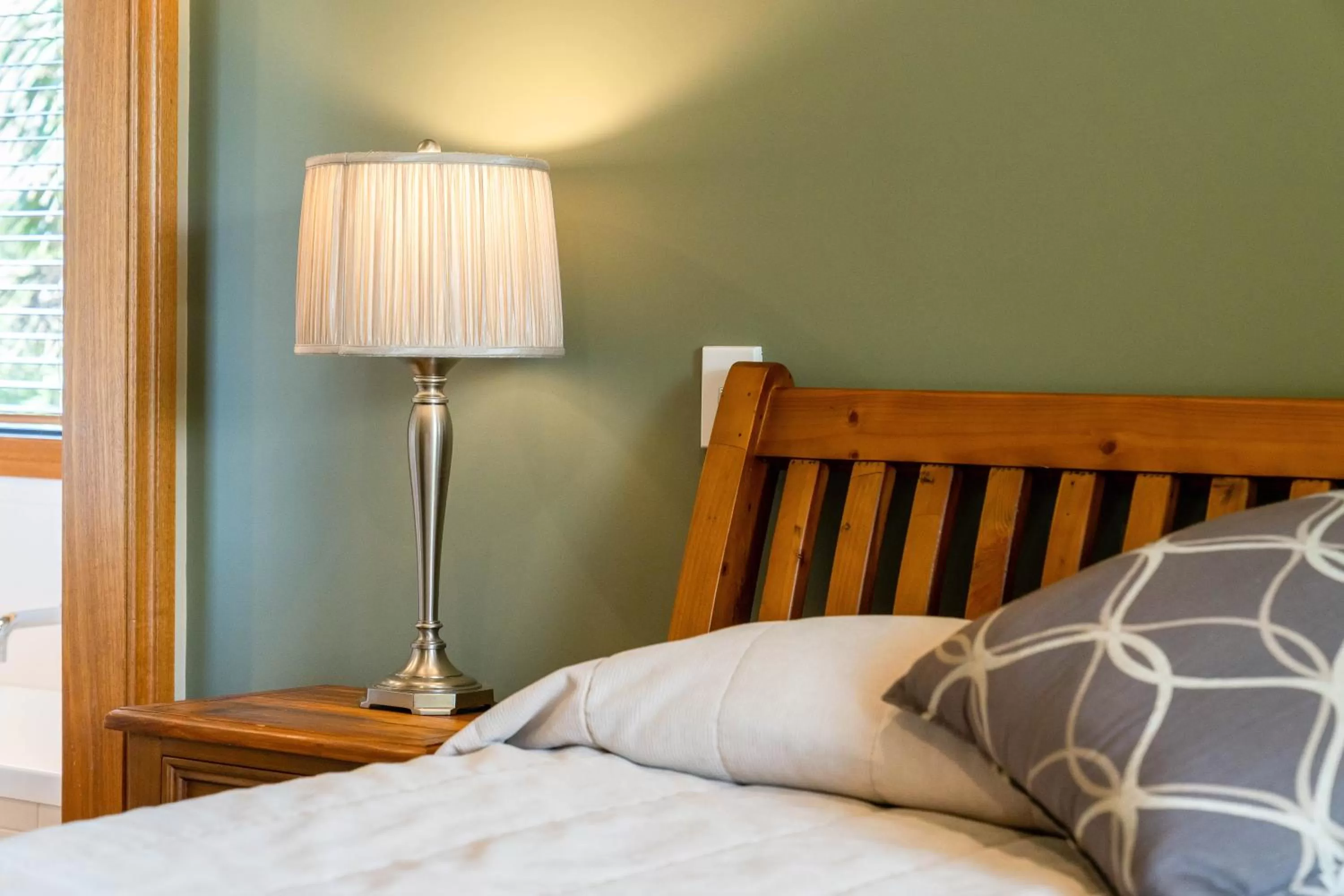 Bed in Wanaka Luxury Apartments