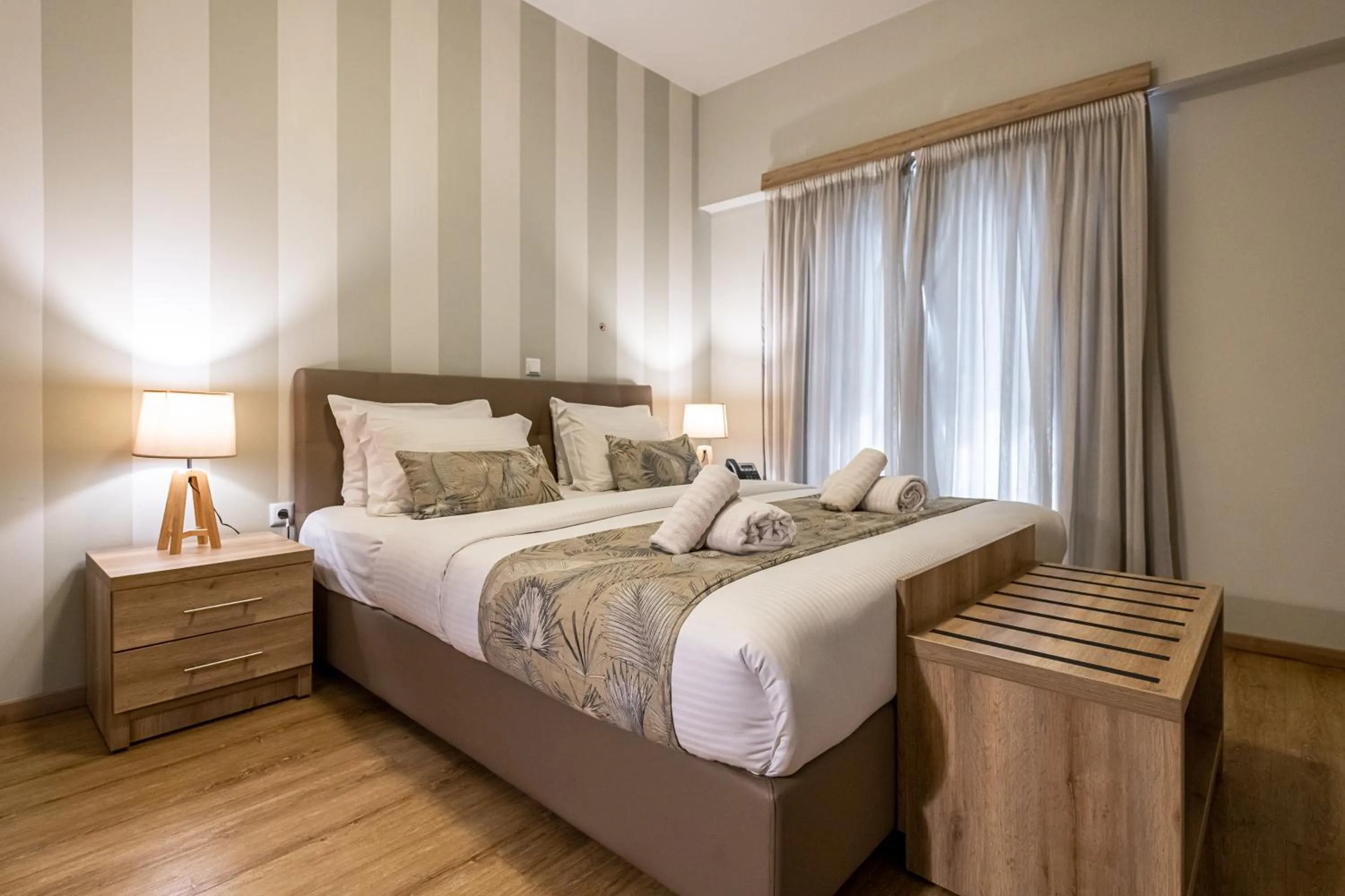 Bed in Hotel @Syngrou Fix