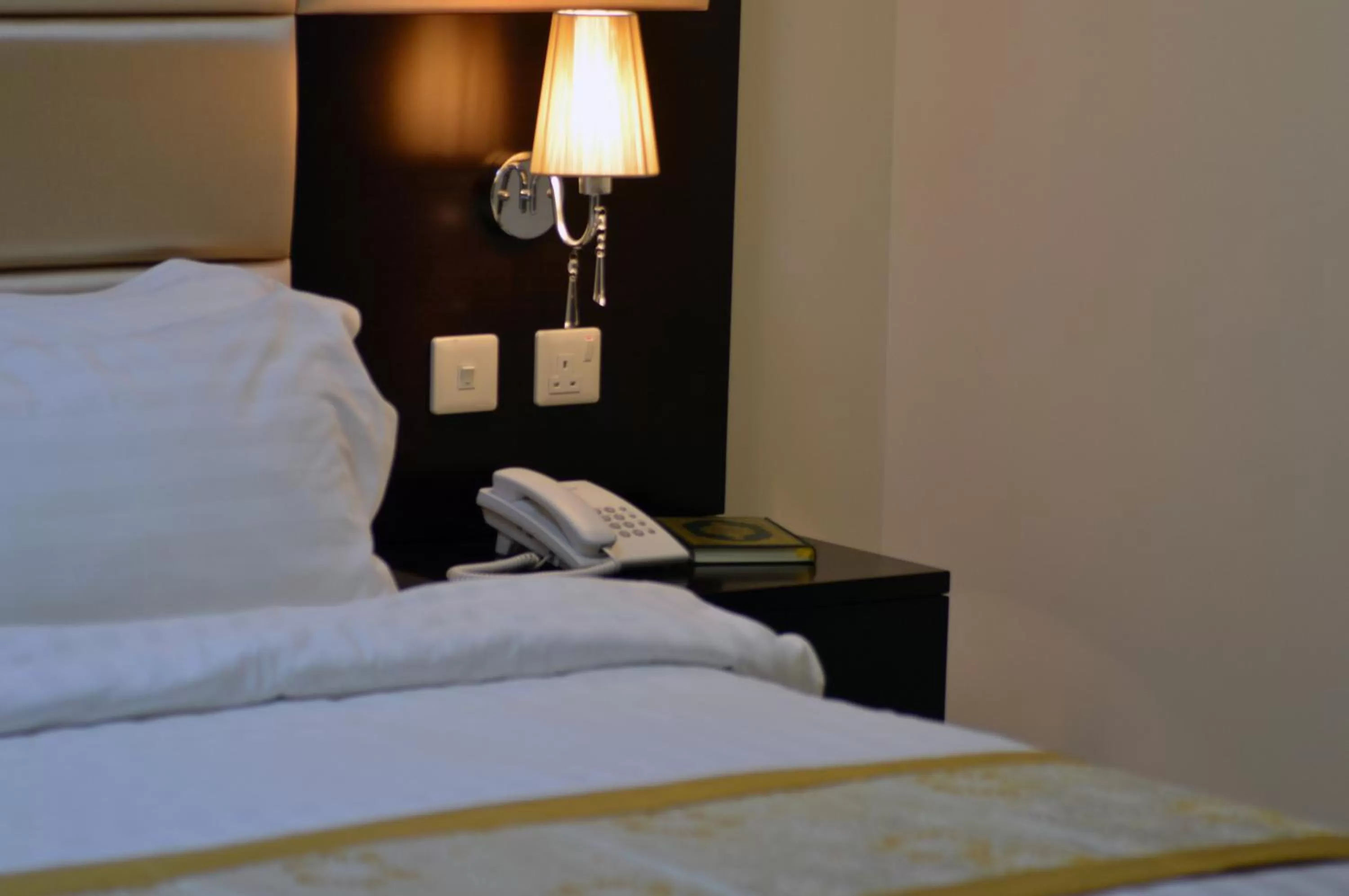 Bed in Arjaan Altakhassusi Hotel Suites