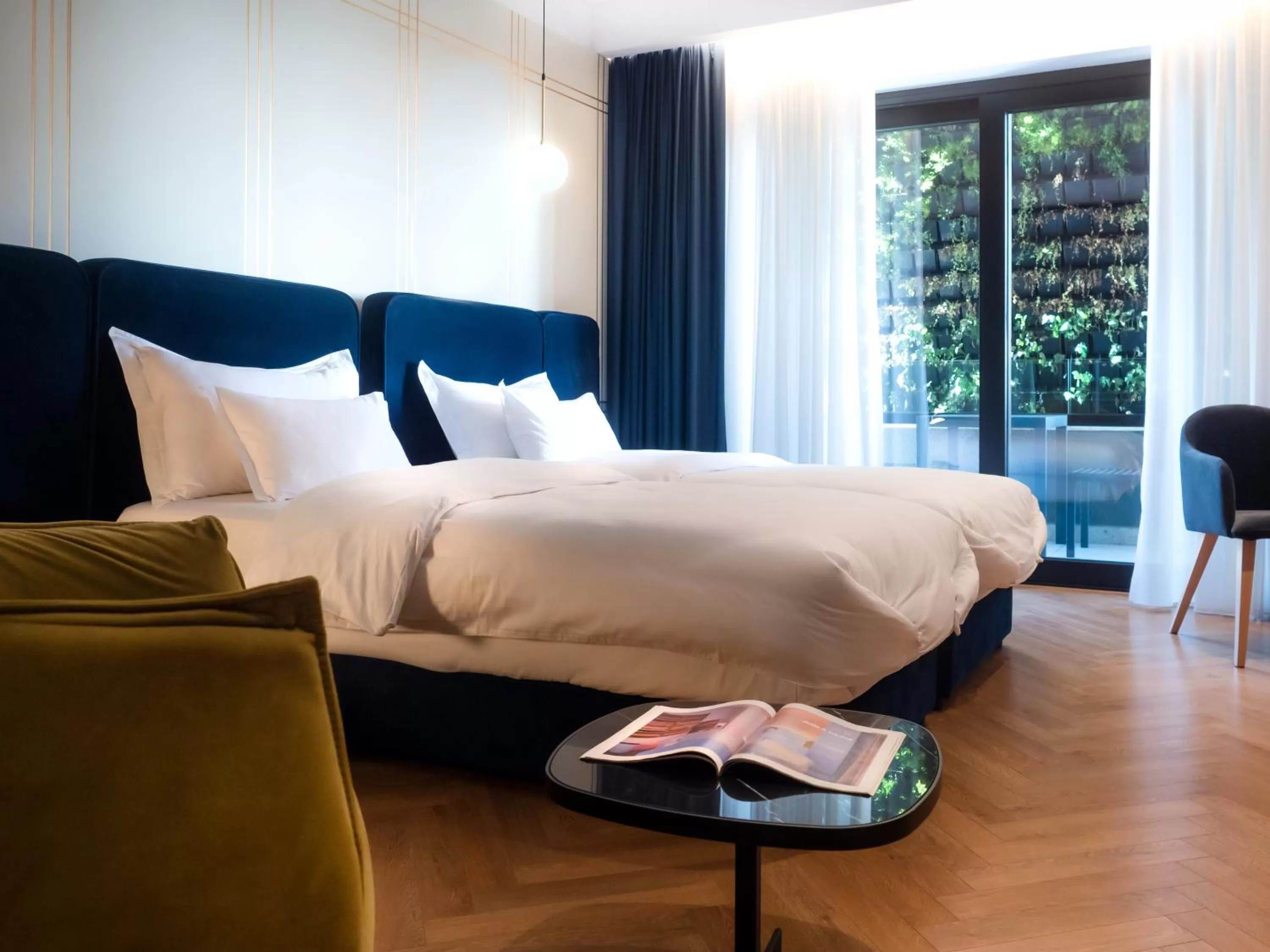 Bed in Moncafe BoutiqueHotel Spa