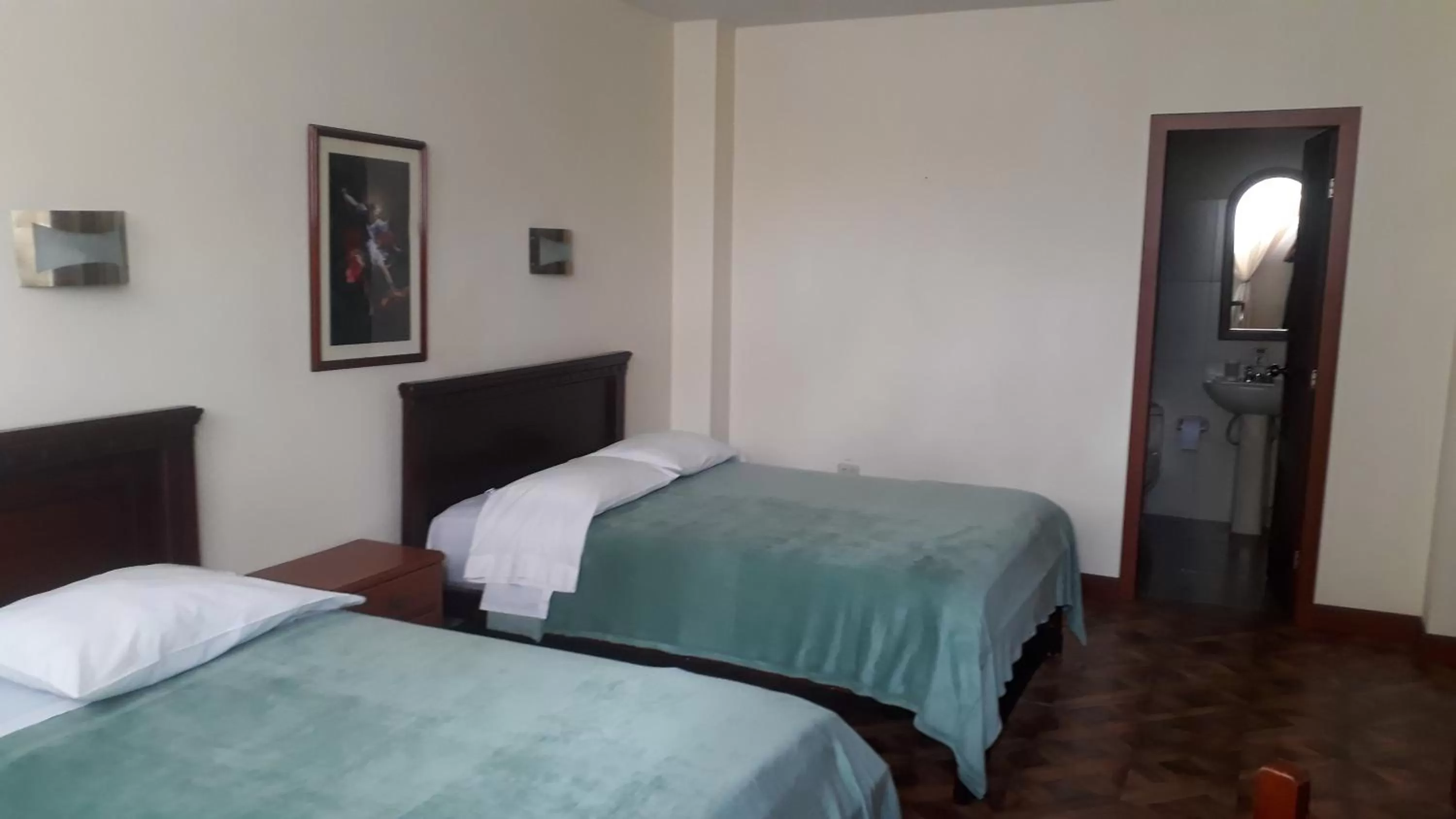 Bed in El Cardenal Hotel