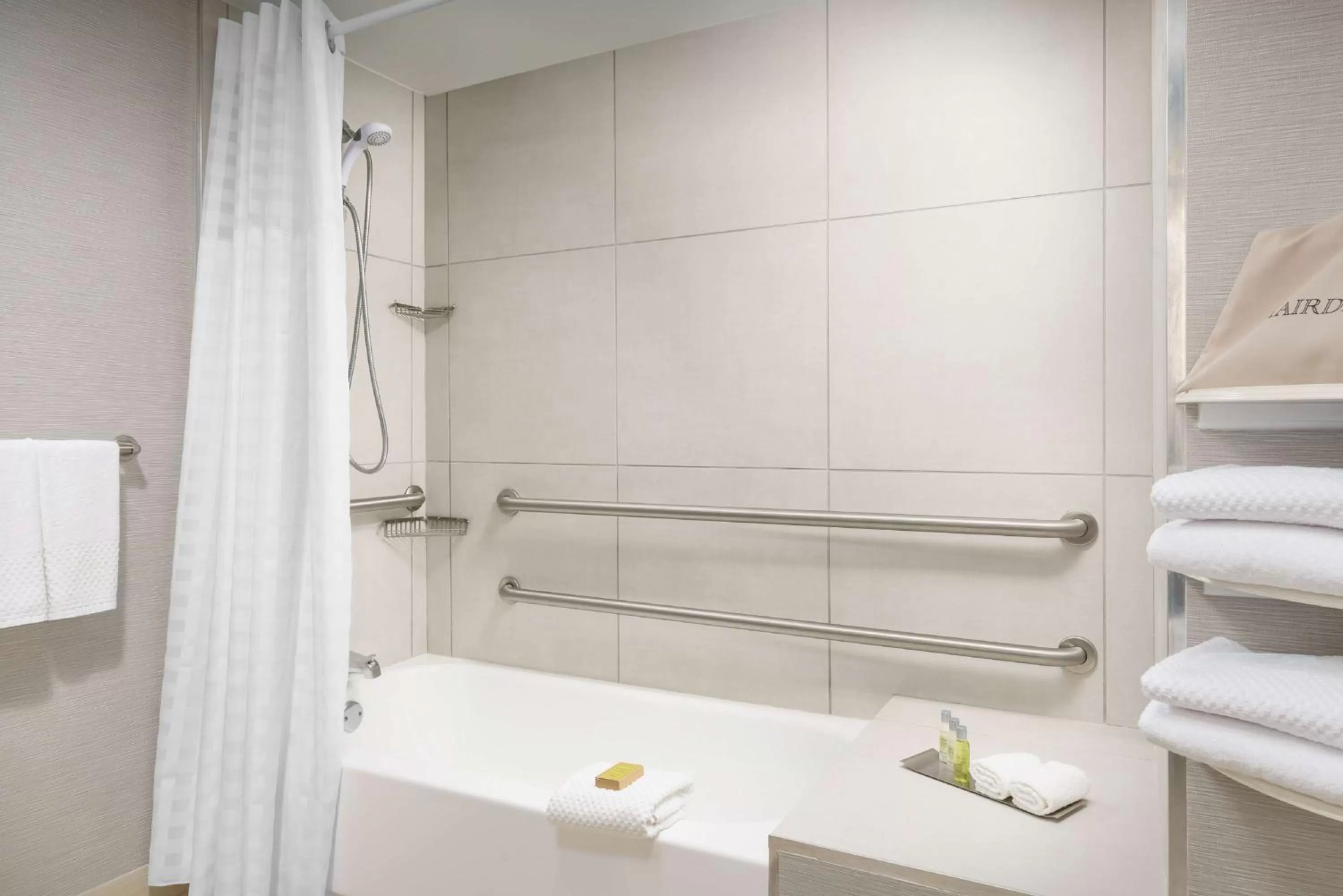 Bathroom in DoubleTree by Hilton Orlando Airport Hotel