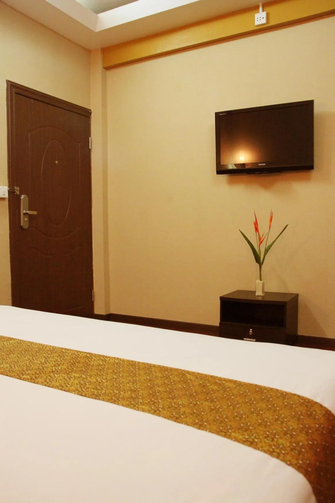 Bed in Visiting Card Hotel & Resort