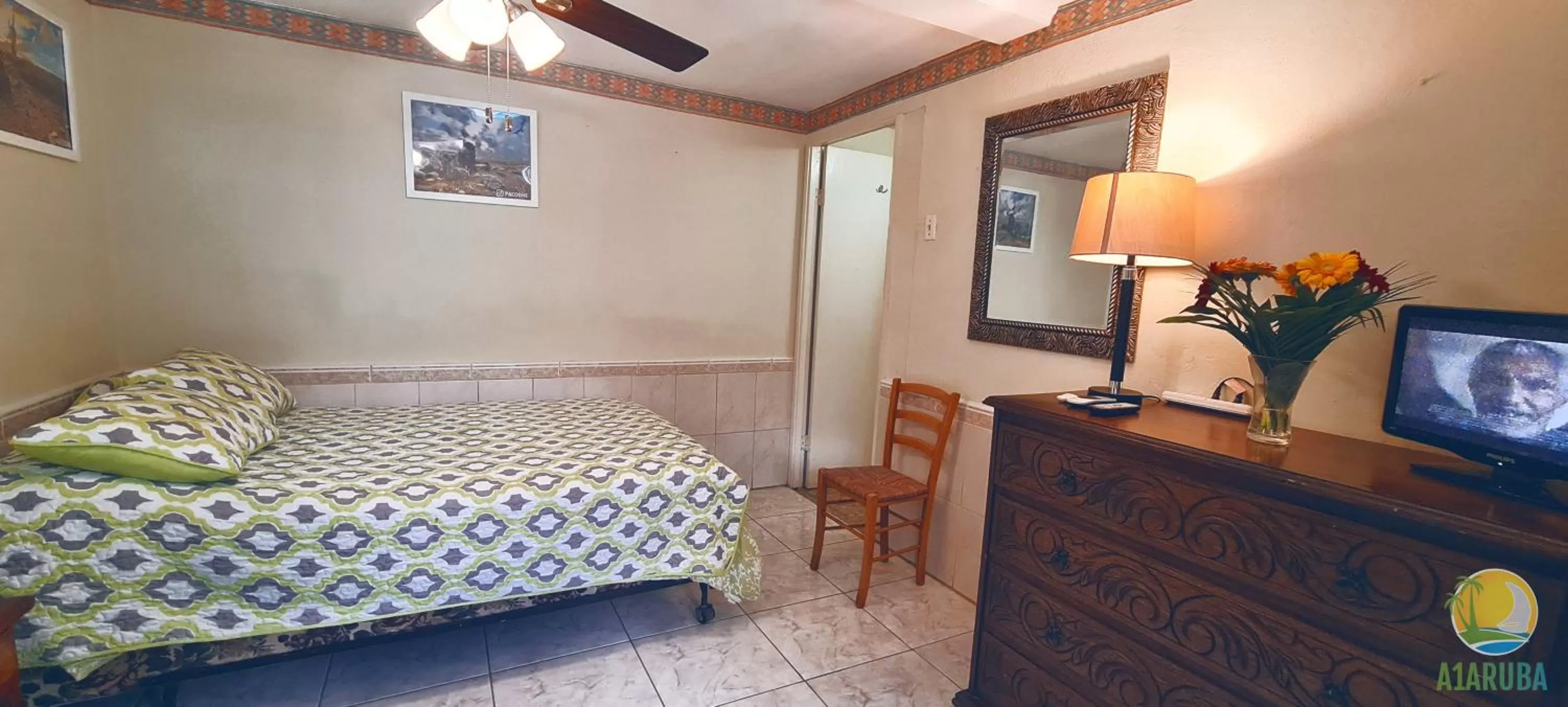 View (from property/room), Bed in A1 Apartments Aruba