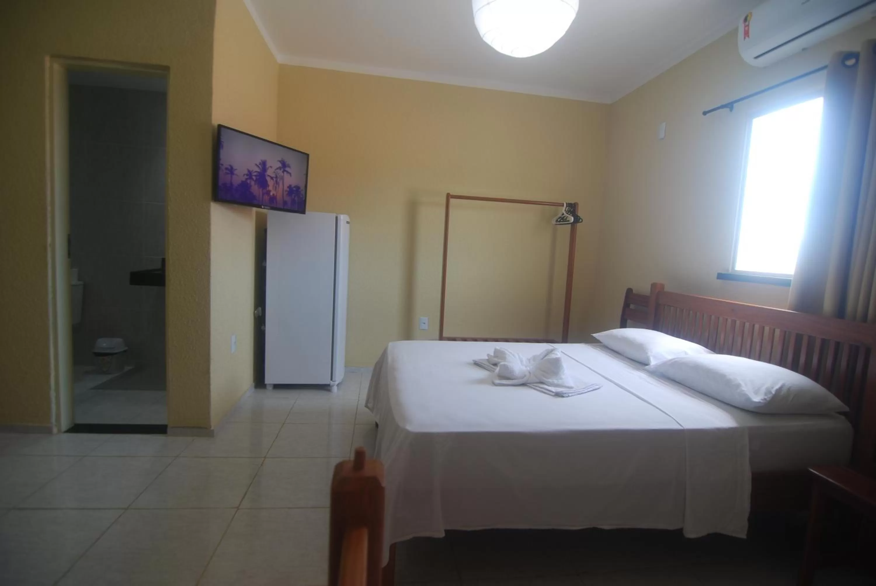 Bed in Refúgio Pousada Fortaleza