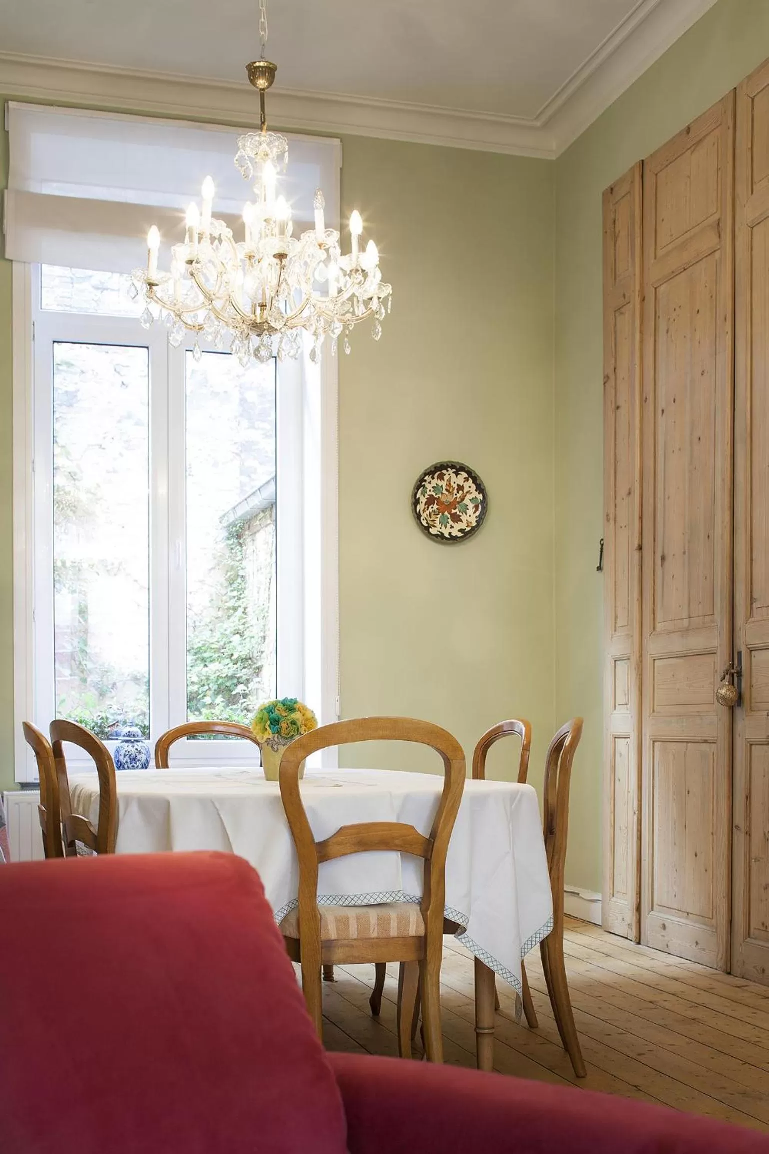 Communal lounge/ TV room in B&B In Bruges