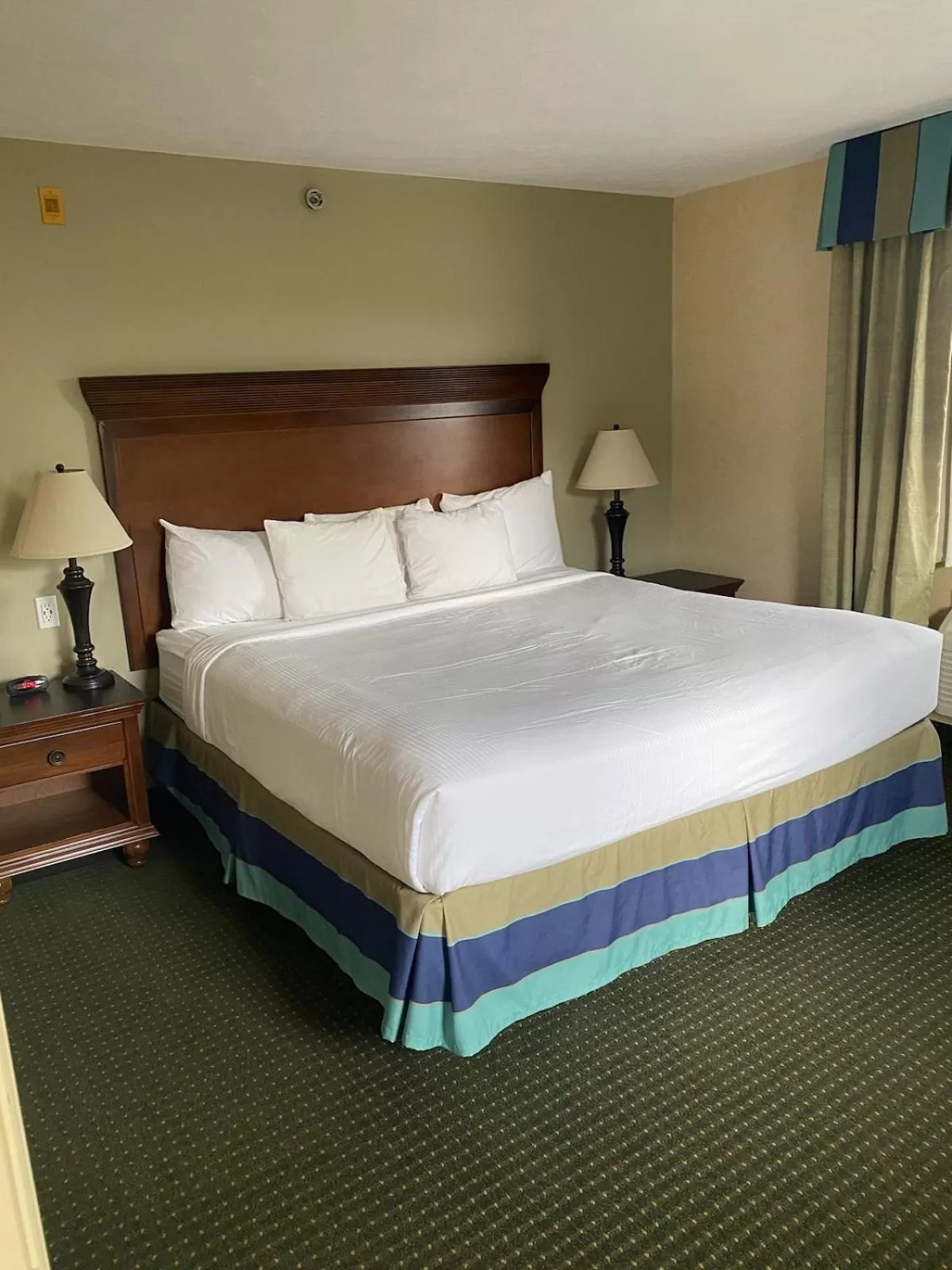 Bed in The Boardwalk Inn