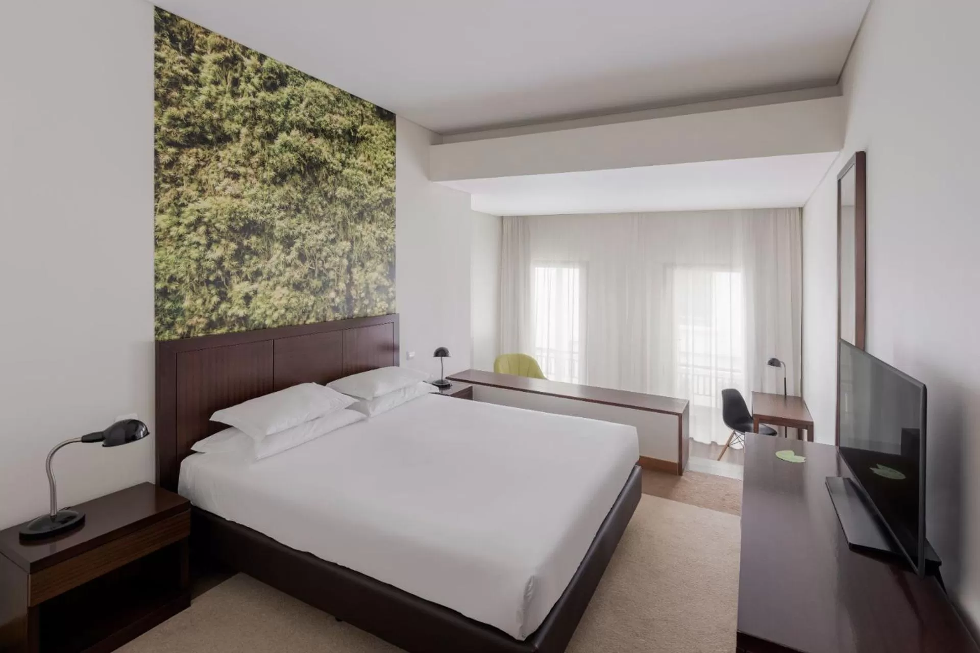 Bed in Neat Hotel Avenida