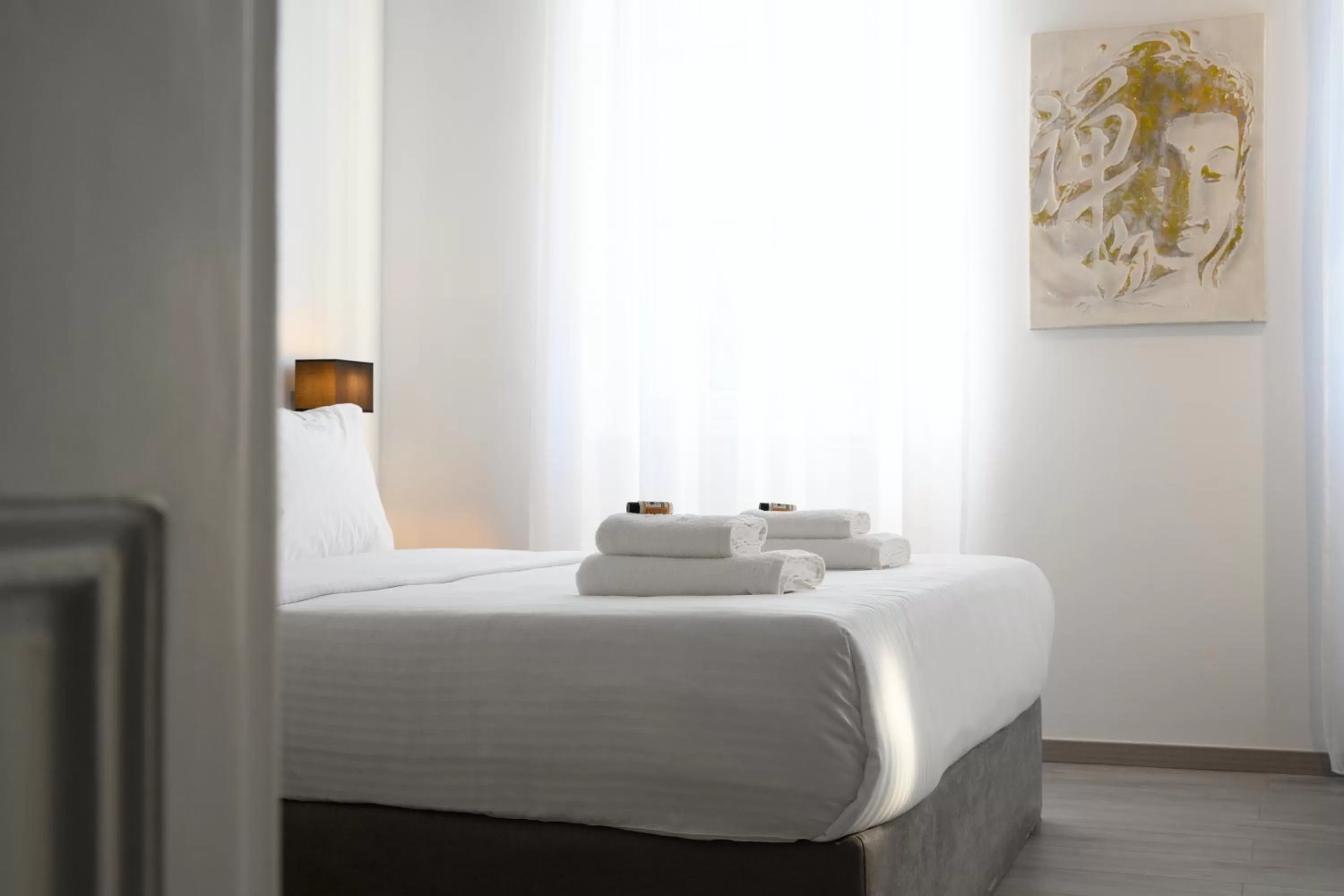 Bed in AMALPHI Corfu City Living