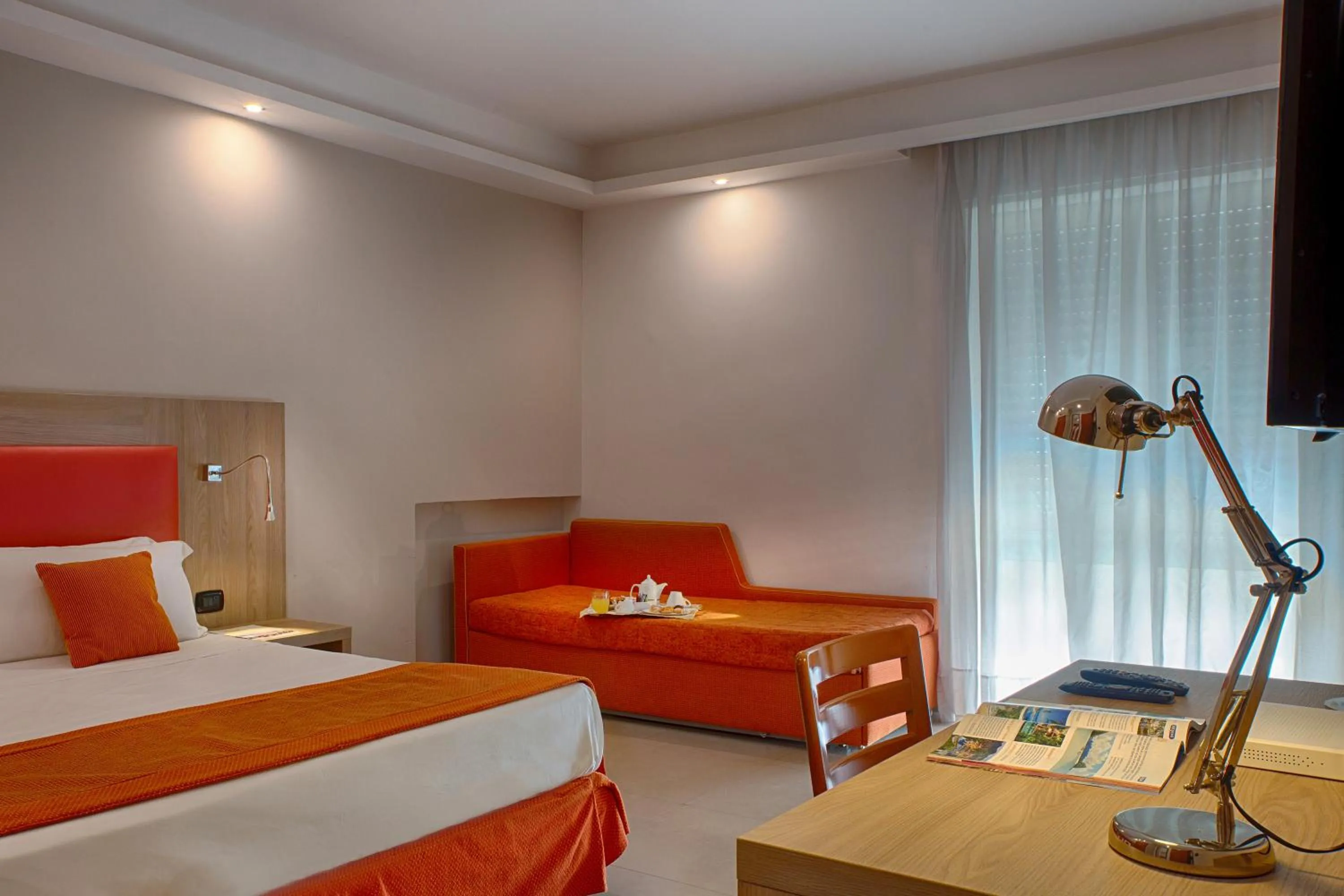 Photo of the whole room, Bed in American Hotel