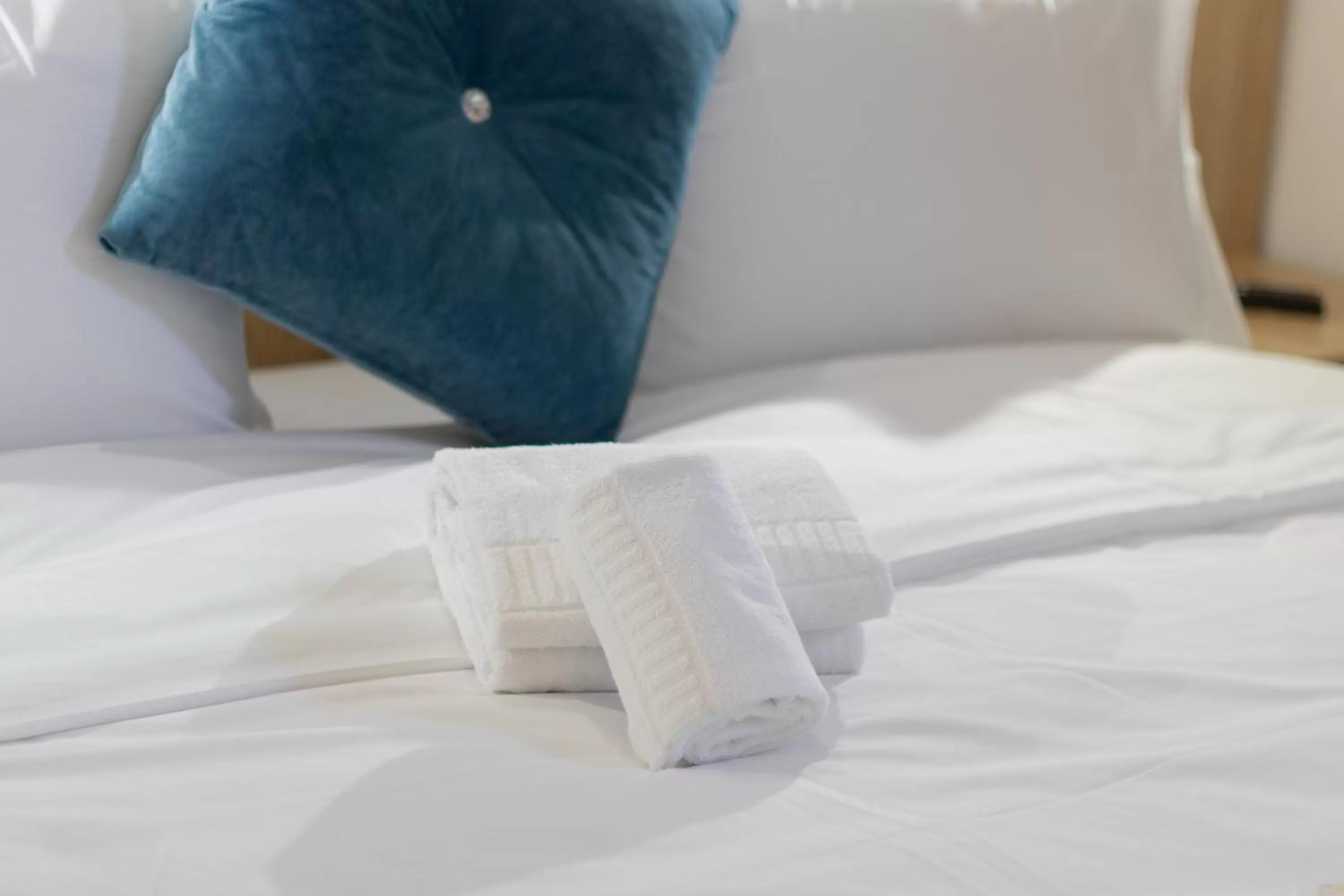 towels, Bed in Karam City Hotel