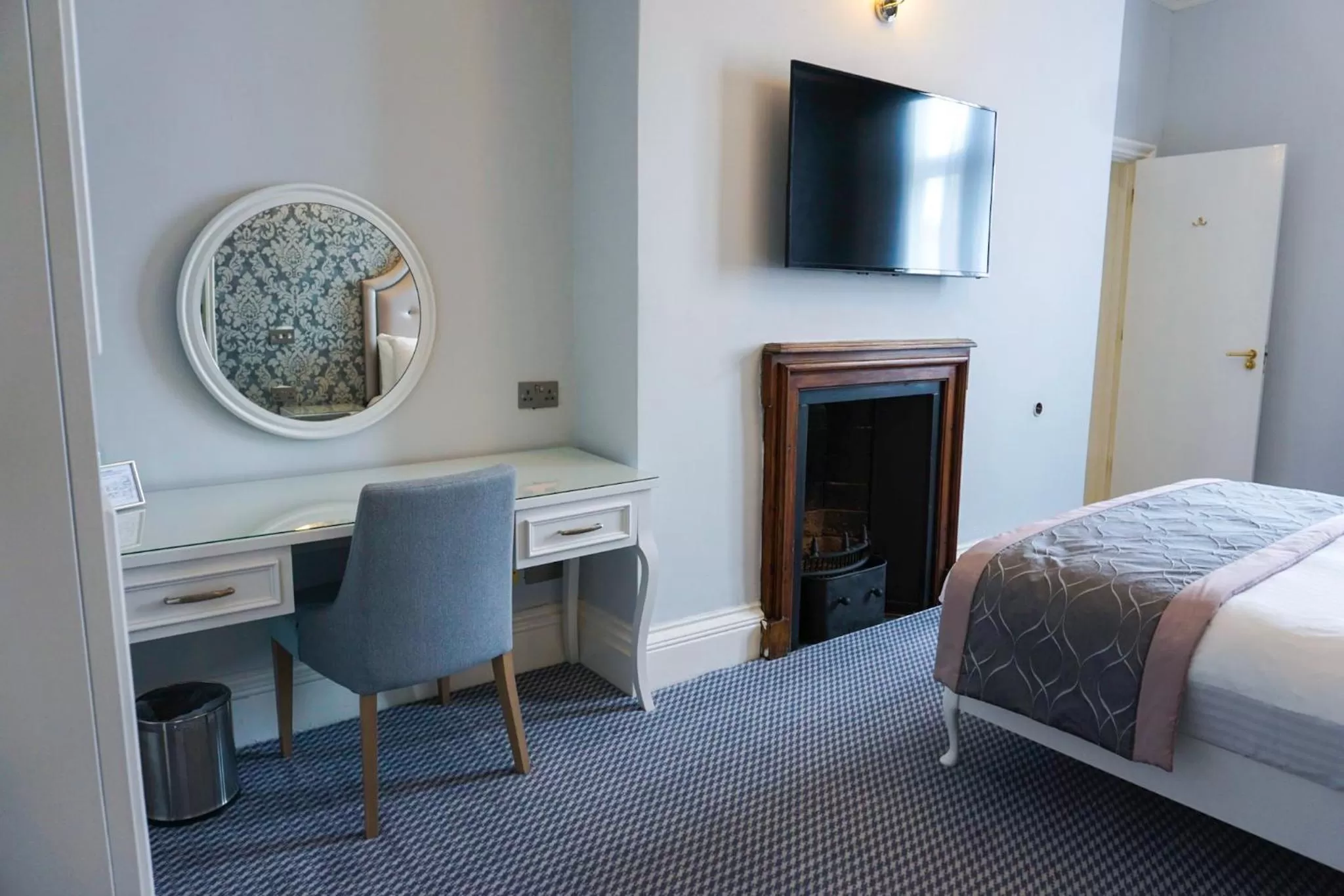 flat iron, TV/Entertainment Center in Wroxall Abbey Hotel