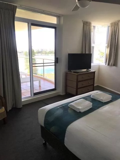 Bed in Sunrise Luxury Apartments