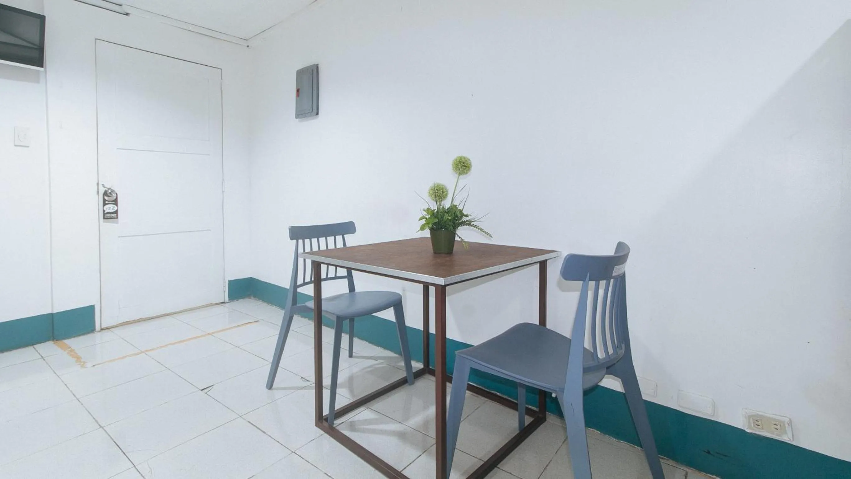 Dining area in RedDoorz at Crowne One Condo