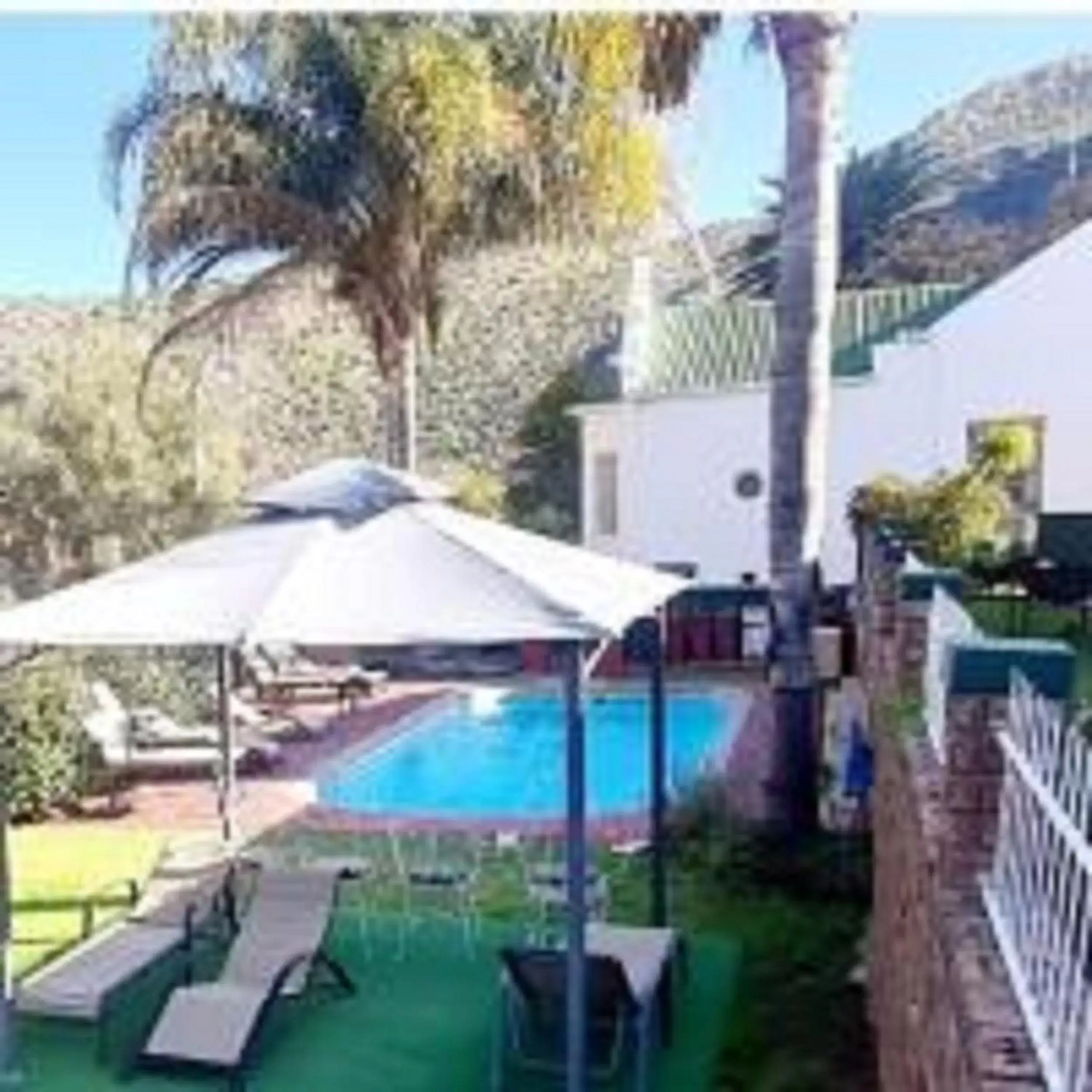 King Room with Pool View in Old Mill Lodge, Seasonal Working Ostrich Farm & Restaurant, Oudtshoorn King Room with Pool View in Old Mill Lodge, Seasonal Working Ostrich Farm & Restaurant, Oudtshoorn