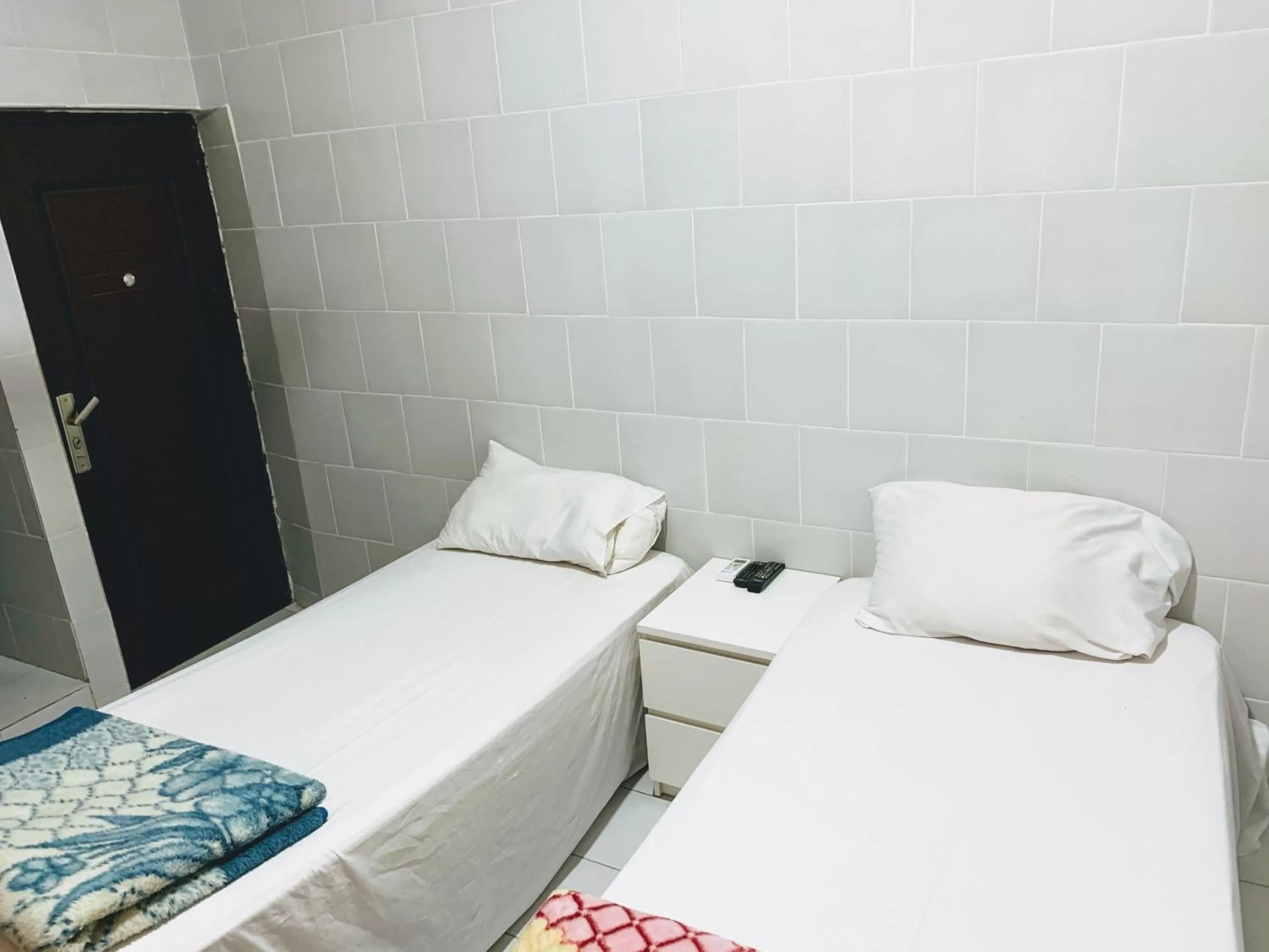 Bed in Woodpecker Resort Hotel