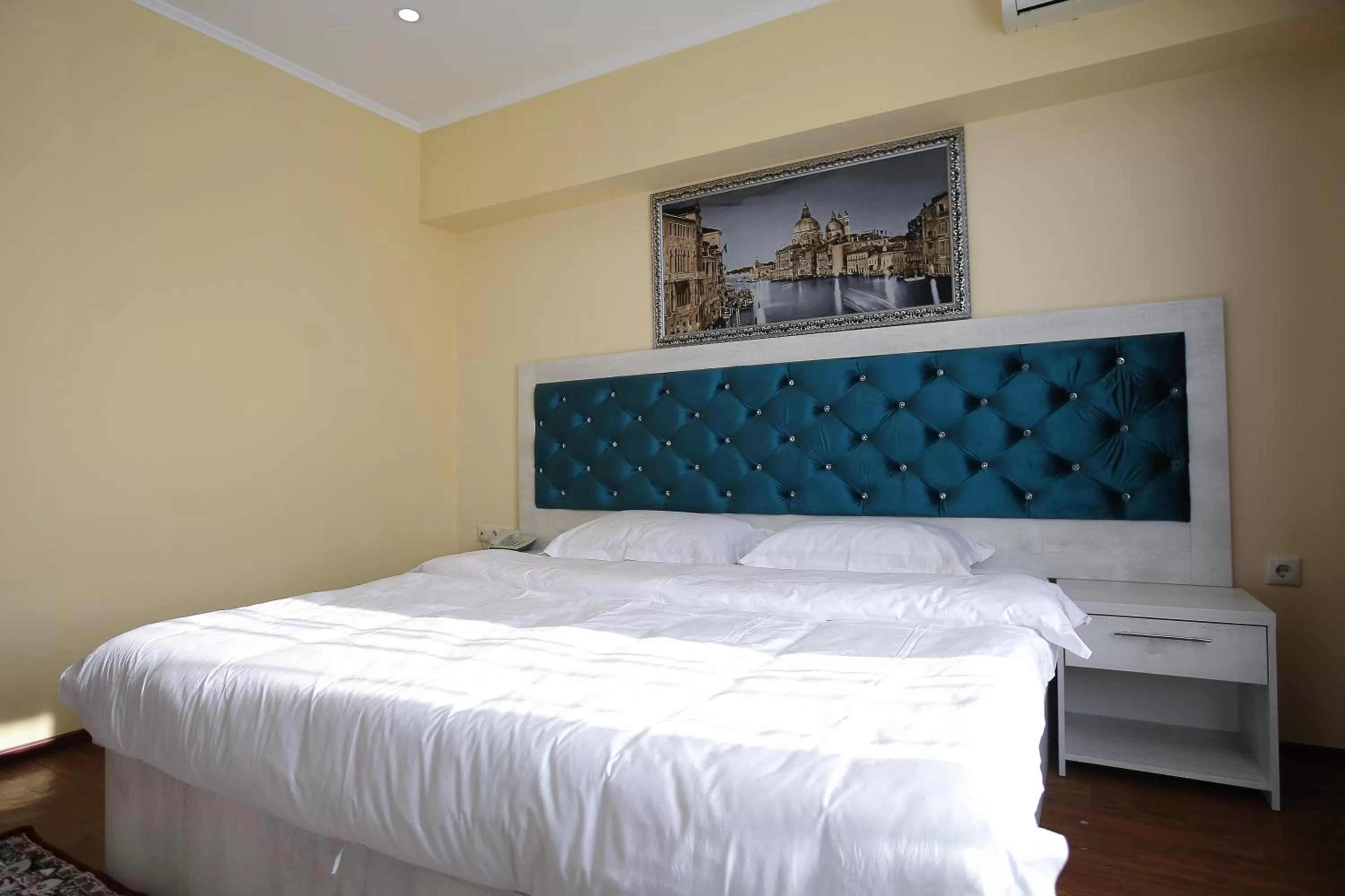 Bed in Altai Business Hotel