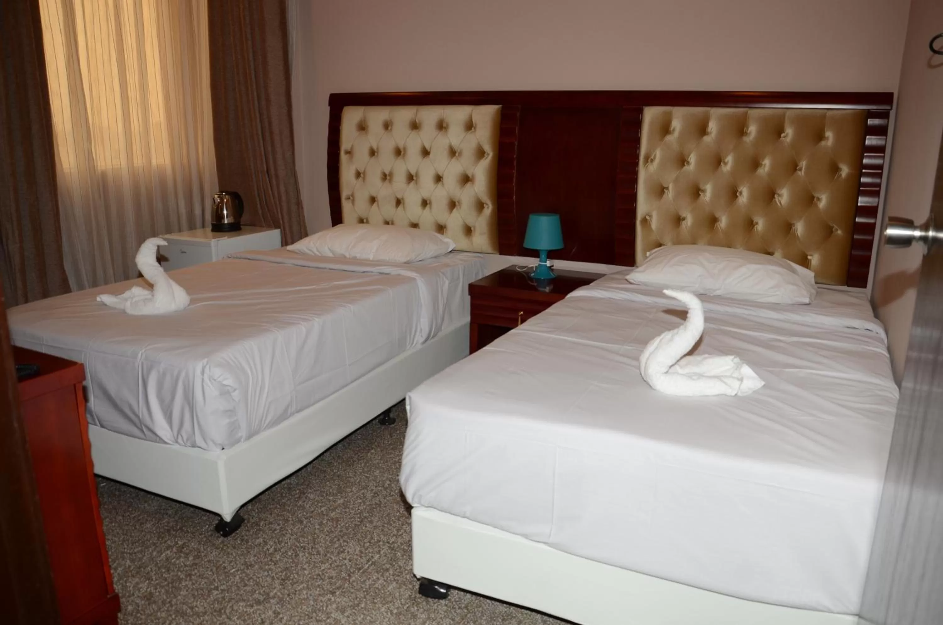Photo of the whole room, Bed in Continental Inn Hotel Al Farwaniya