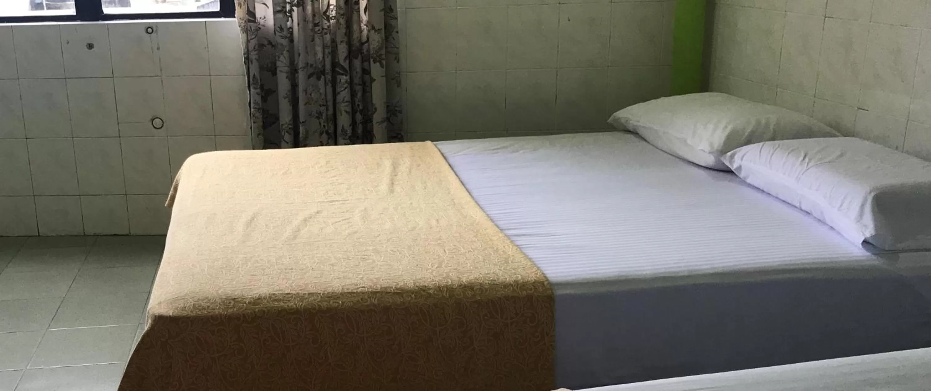 Bed in Hotel Cahaya