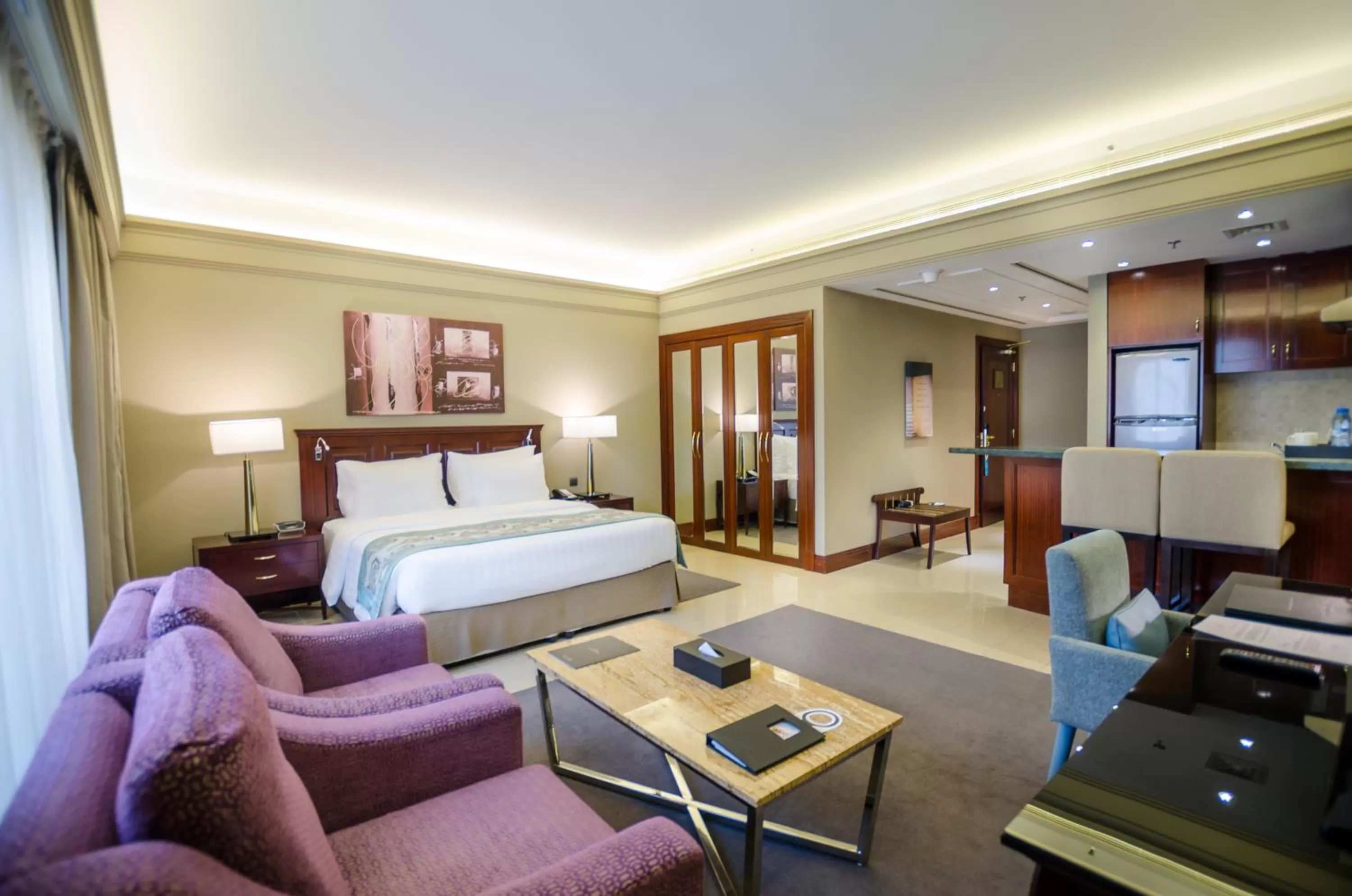 Bed in Somewhere Hotel Apartment