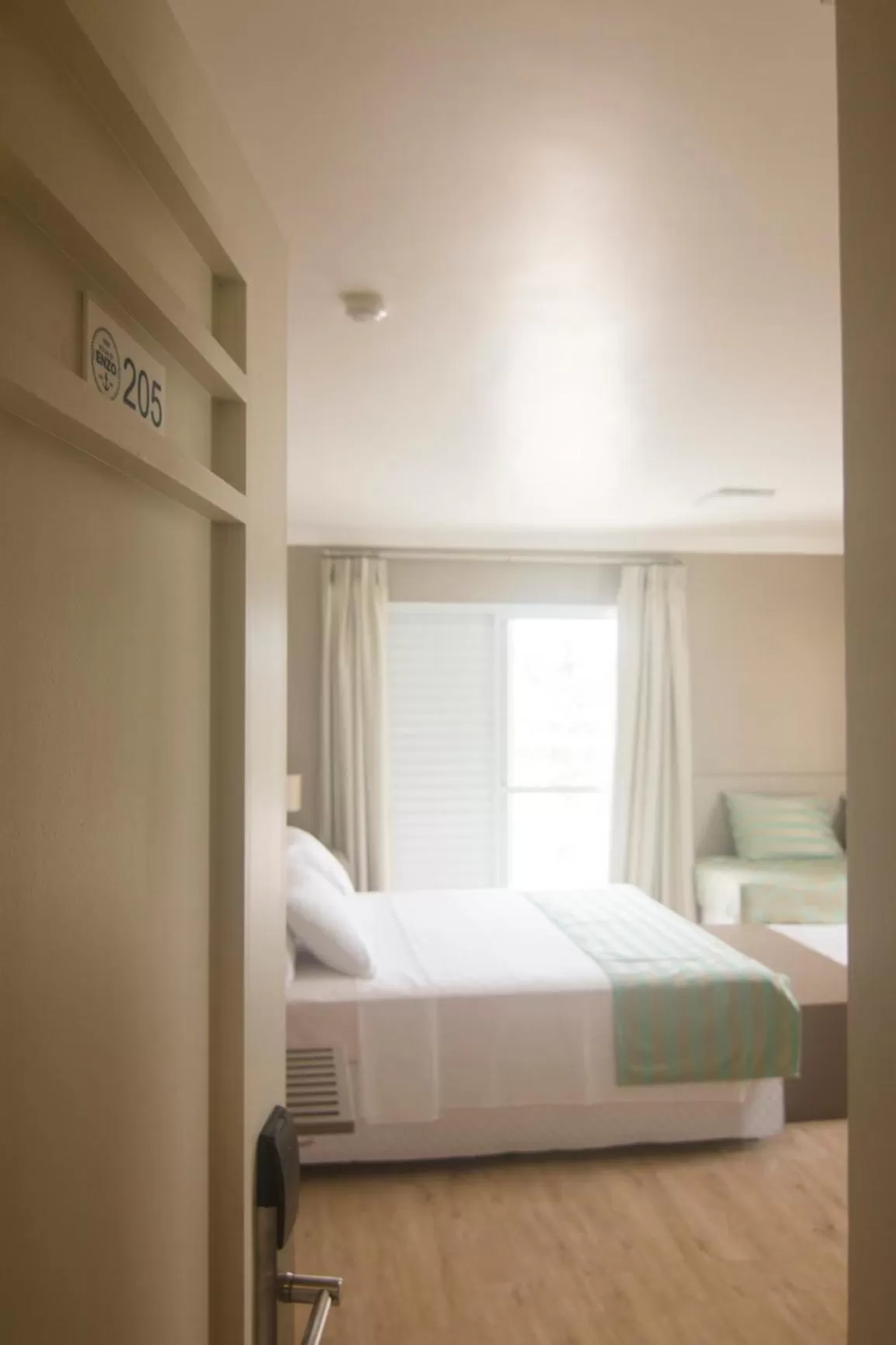 Property building, Bed in Pousada Villa Di Enzo