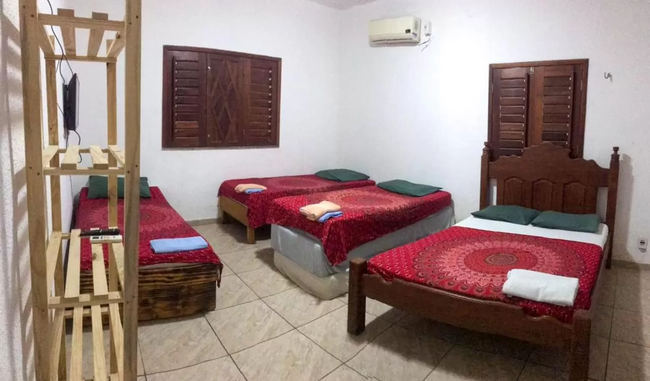 Bed in Pousada Casa de Vó