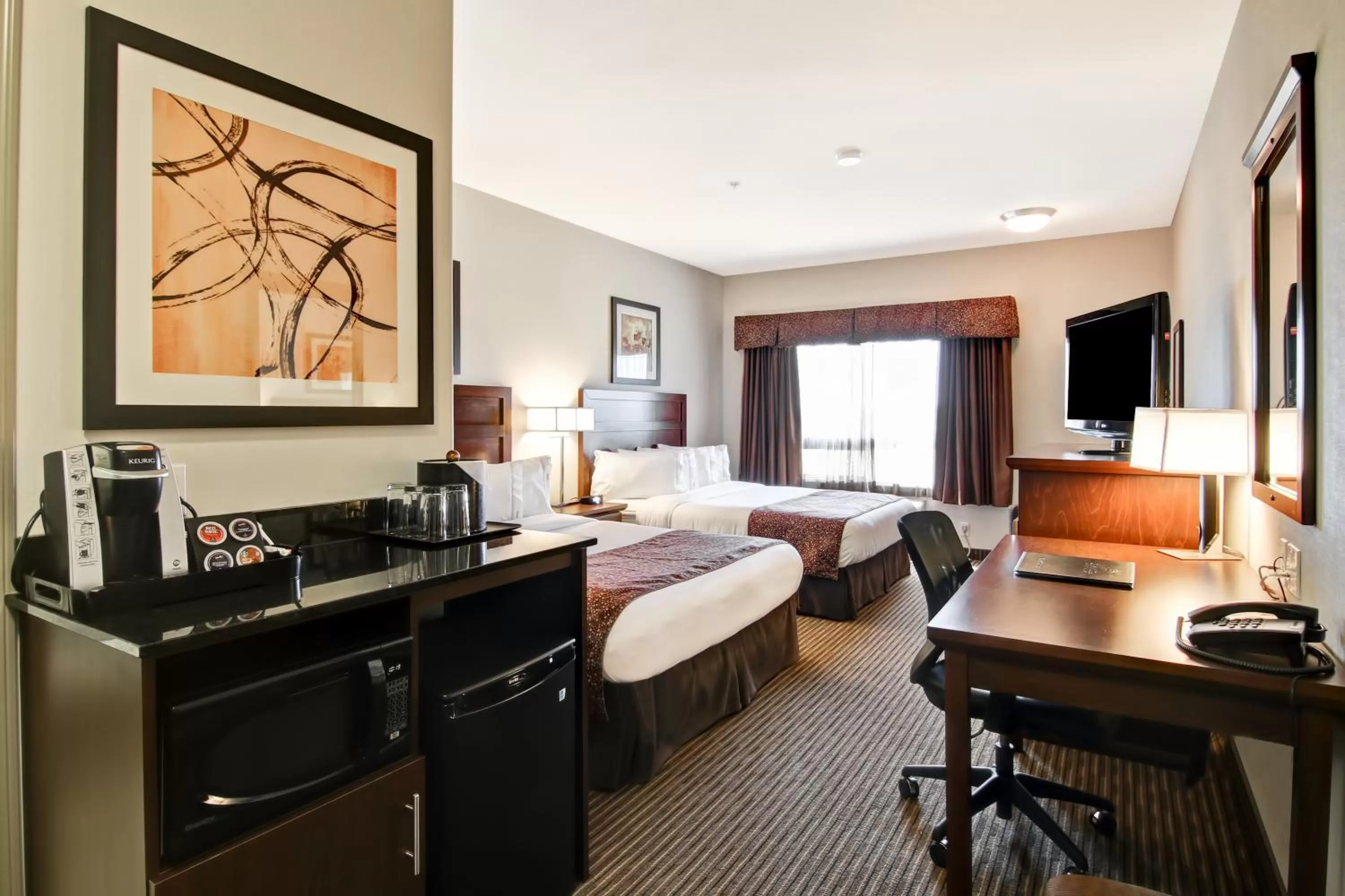 Photo of the whole room, Bed in Canalta Hotel Tisdale