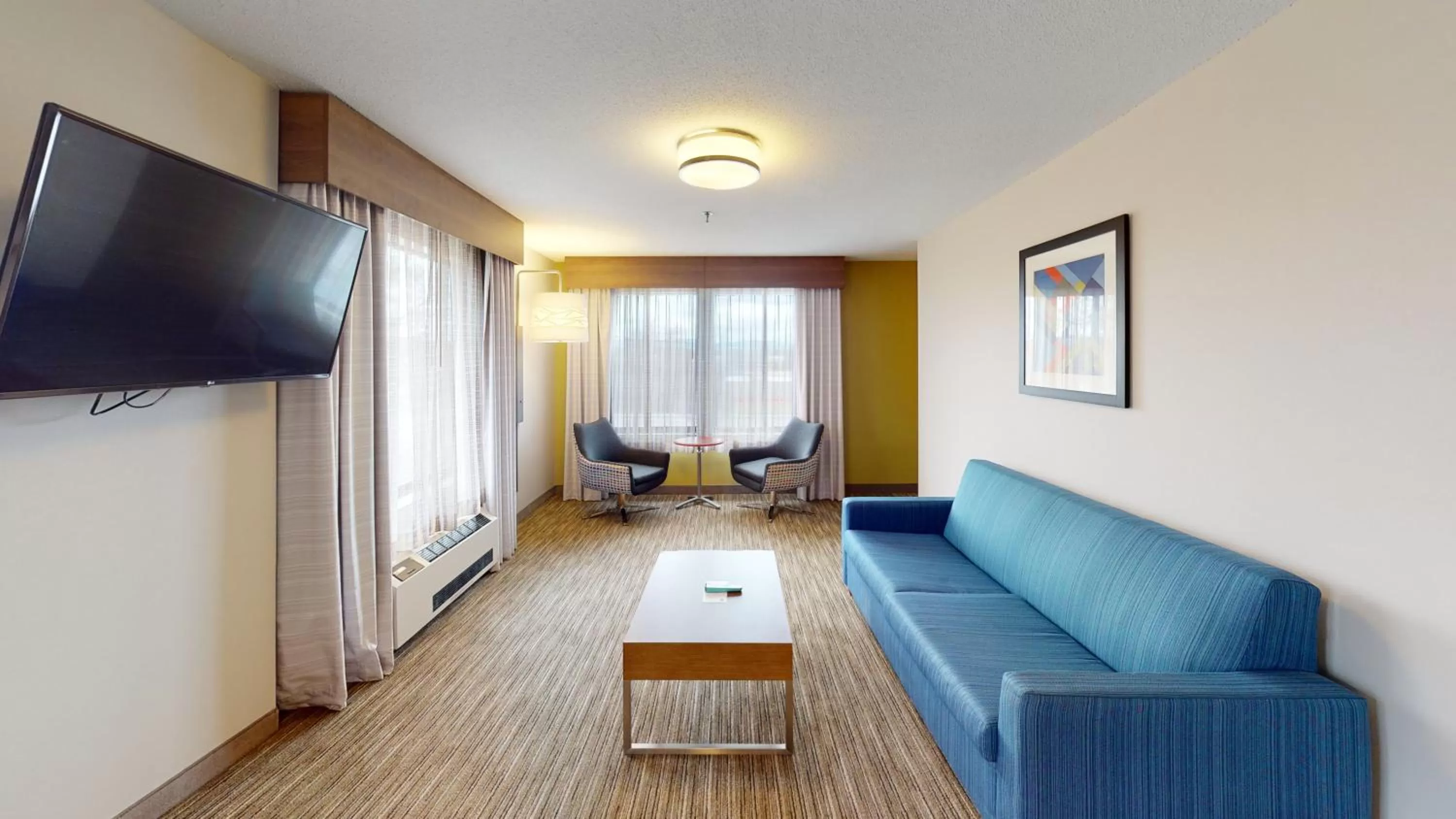 Living room in Holiday Inn Express South Burlington by IHG