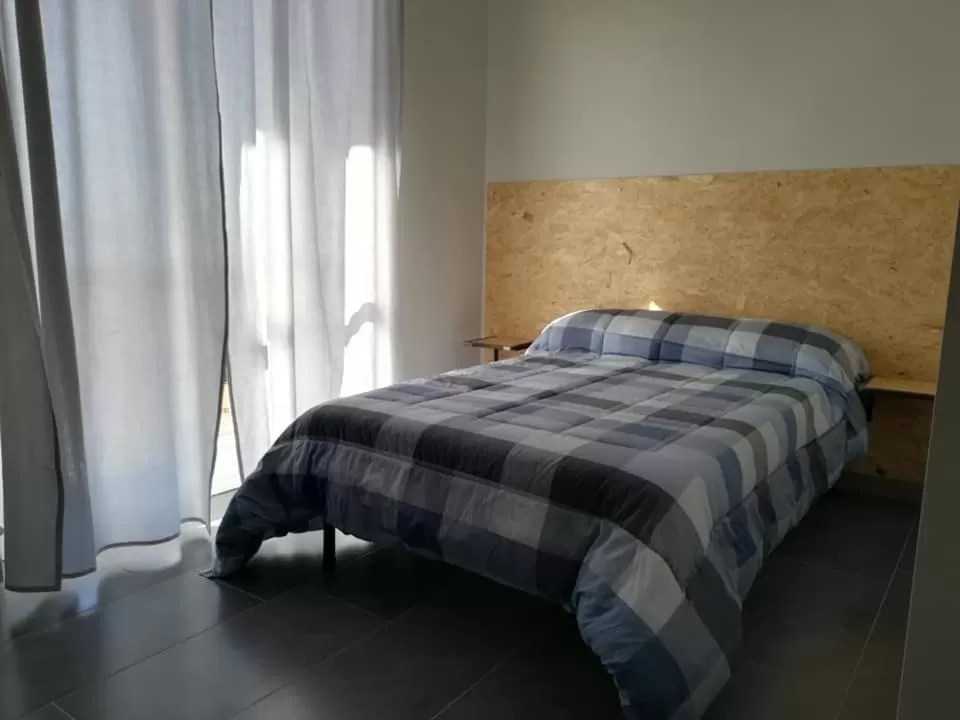 Bed in LE MURA Foresteria