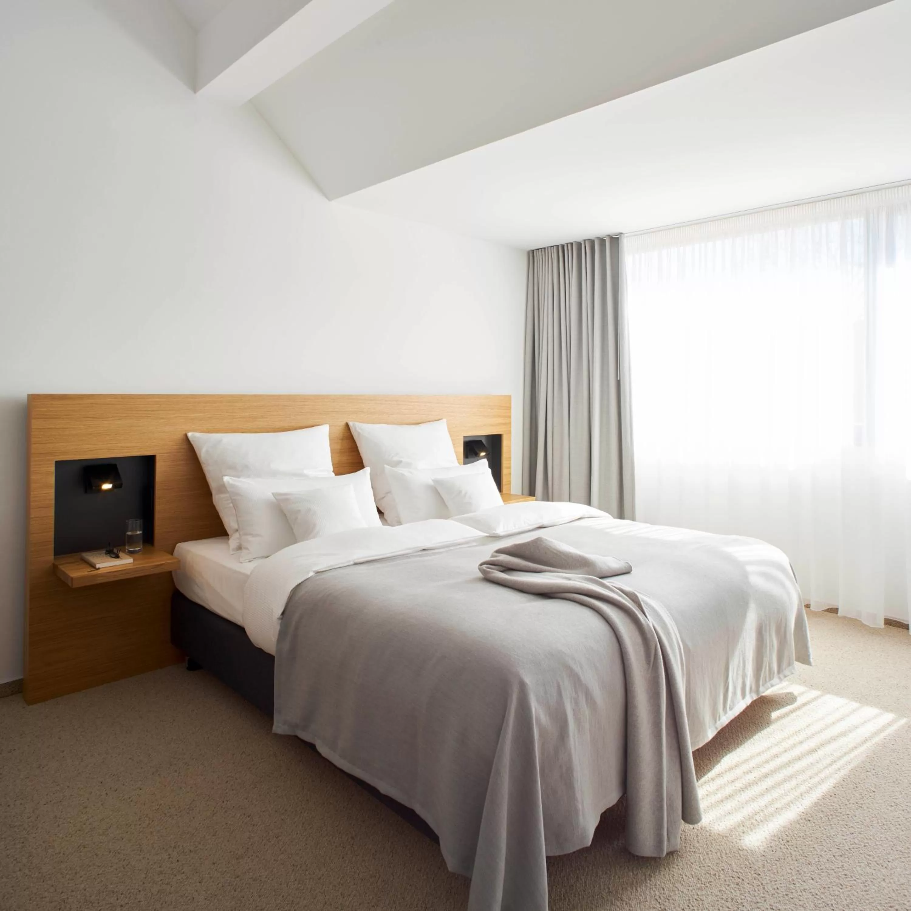 Bedroom, Bed in meinwolfsburg hotel auf dem rittergut vormals Yard Boarding Hotel