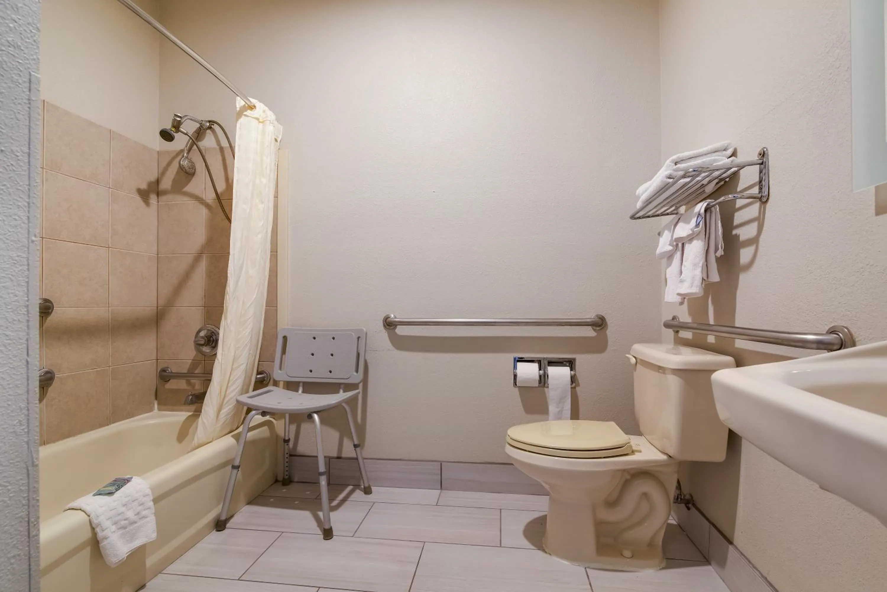 Bathroom in SureStay Plus Hotel by Best Western Topeka