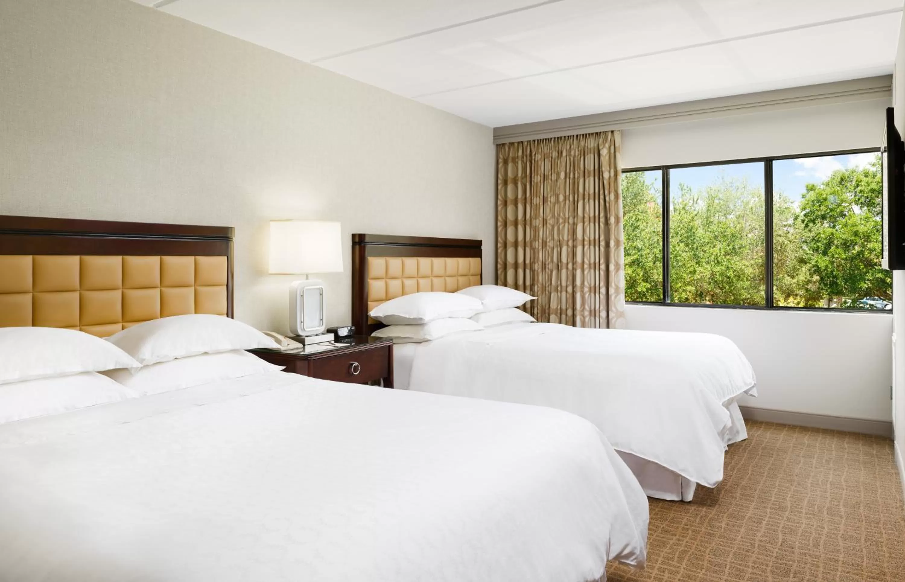 Bedroom, Bed in Sheraton Suites Orlando Airport Hotel