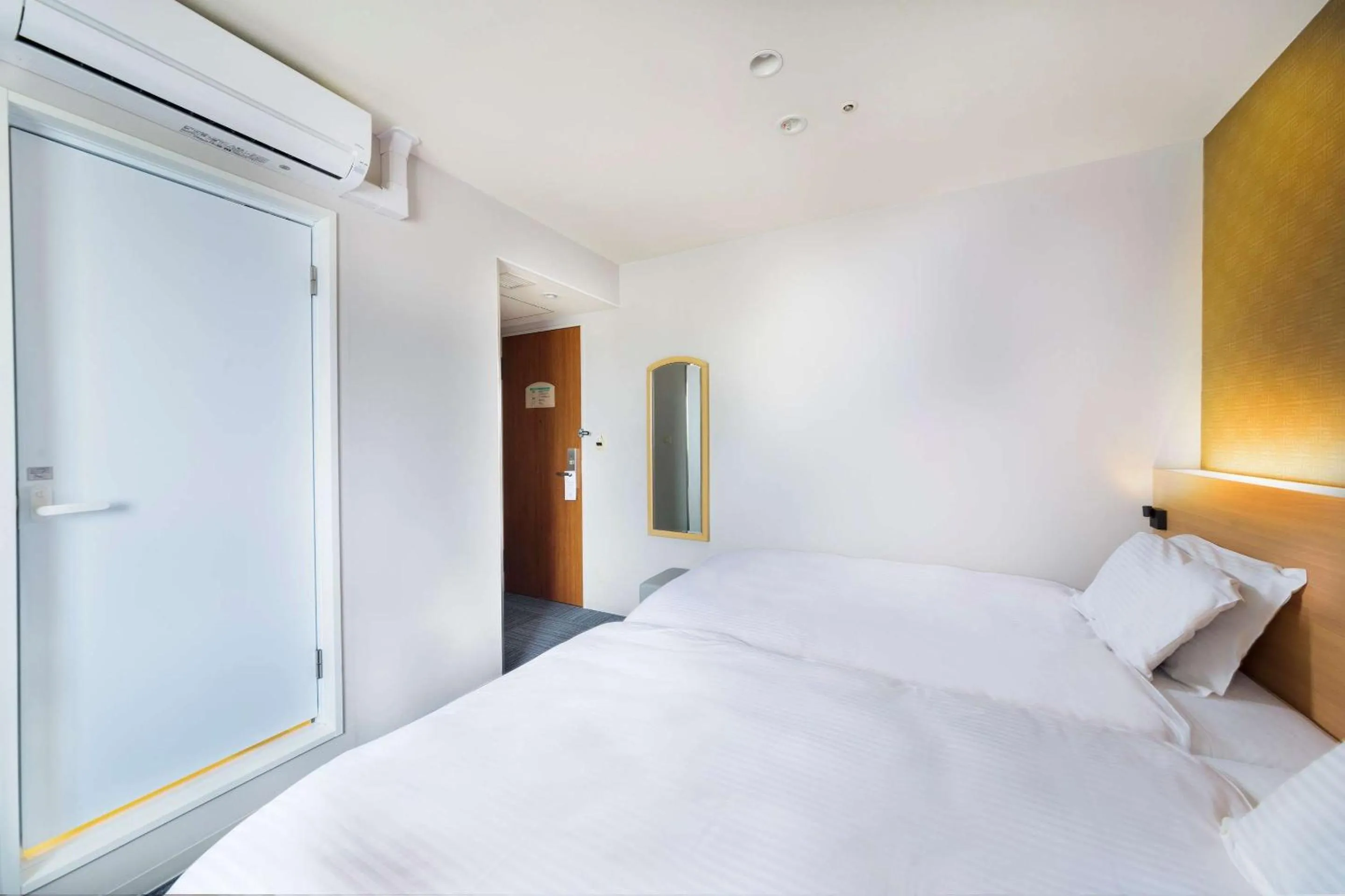 Bathroom in SureStay Plus Hotel by Best Western Shin-Osaka