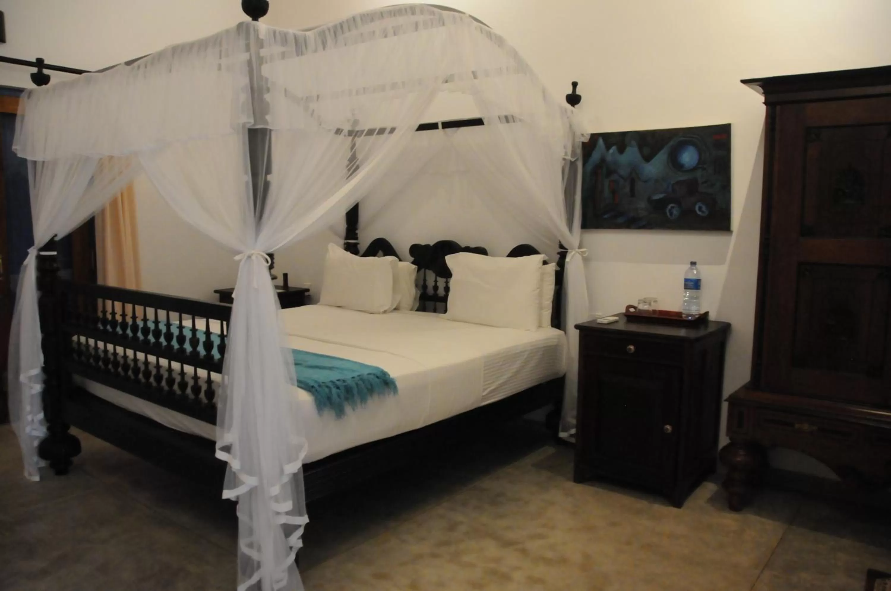 Bed in Villa Atulya at Ocean's edge