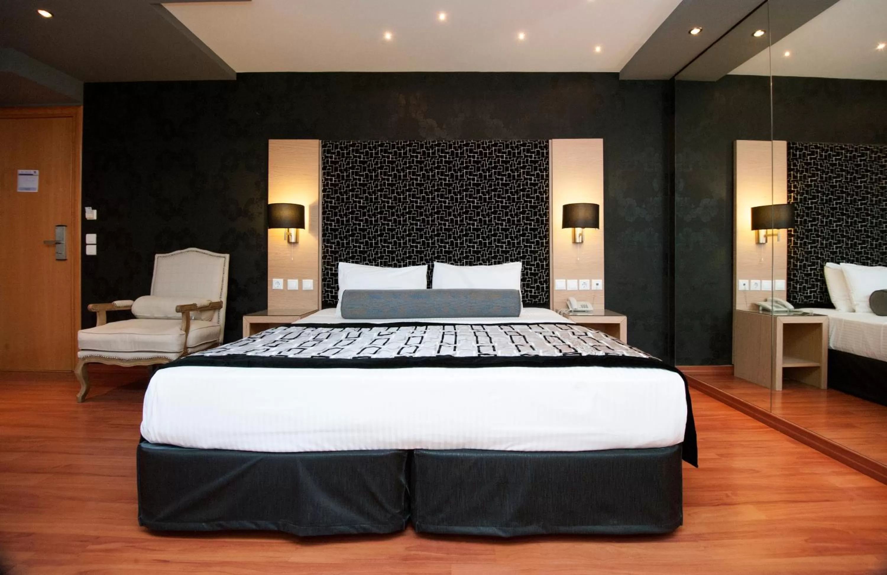 Bed in Nefeli Hotel Alimos