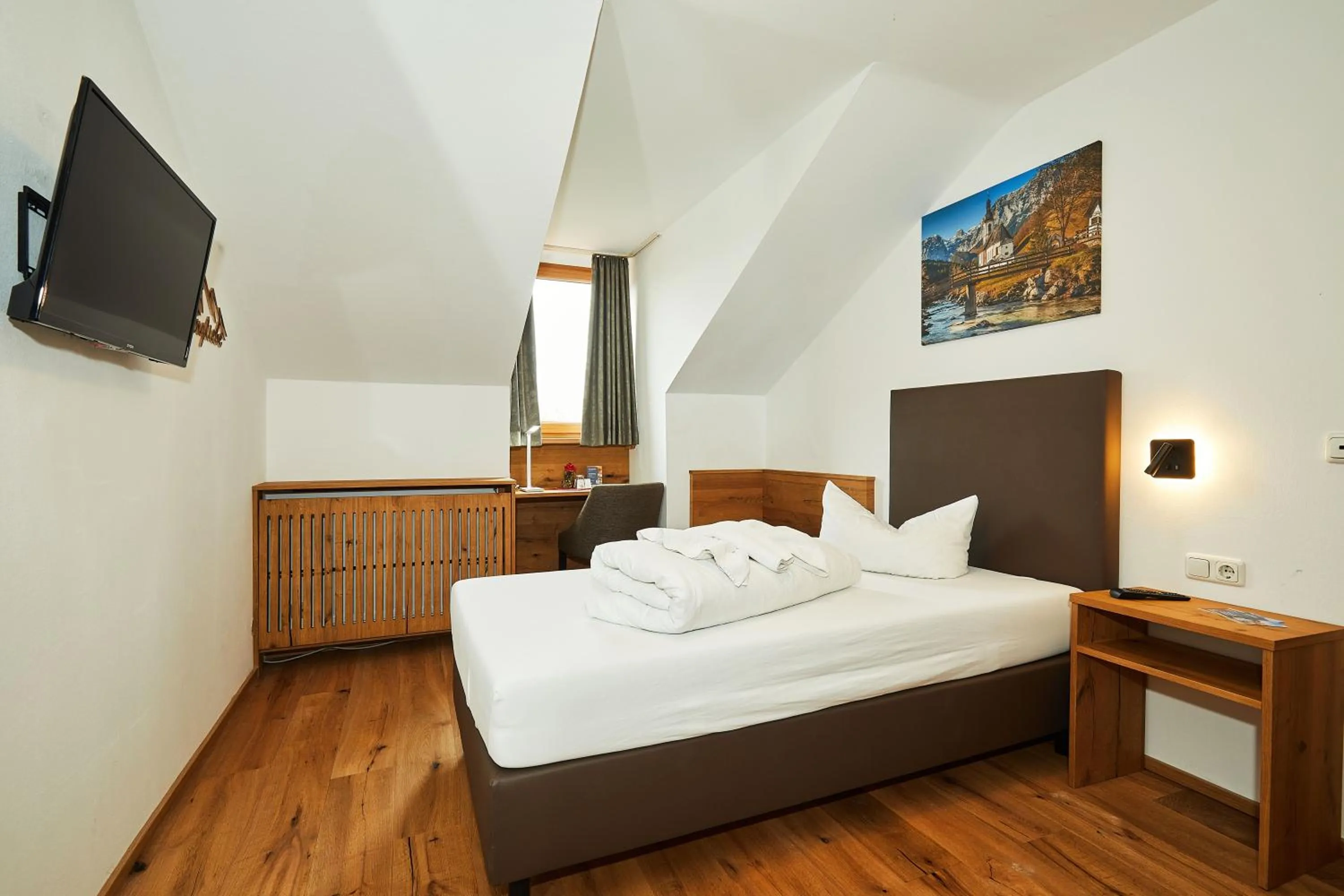 Communal lounge/ TV room, Bed in Hotel Rupertihof