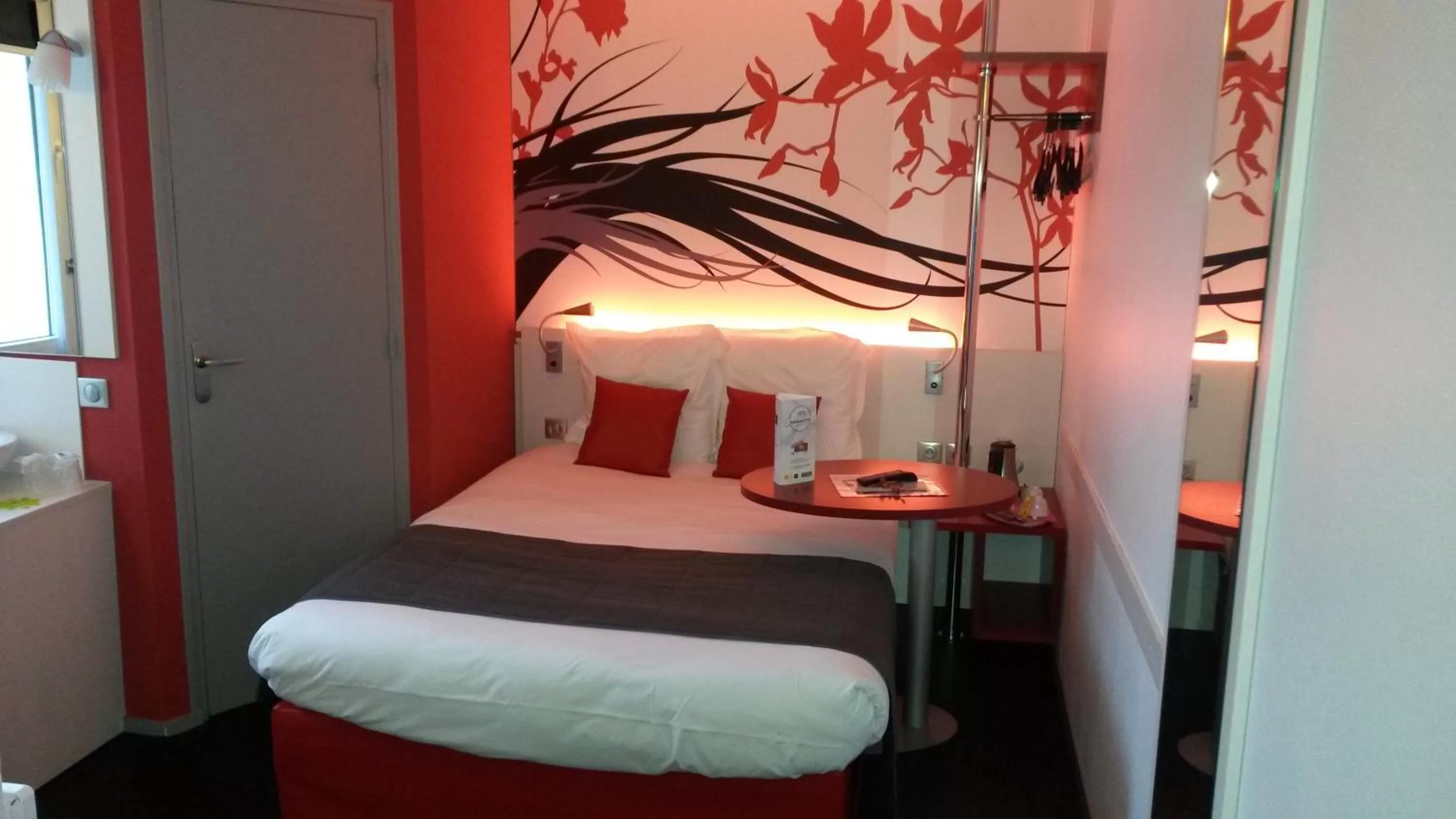 Bed in Kyriad Quimper Sud