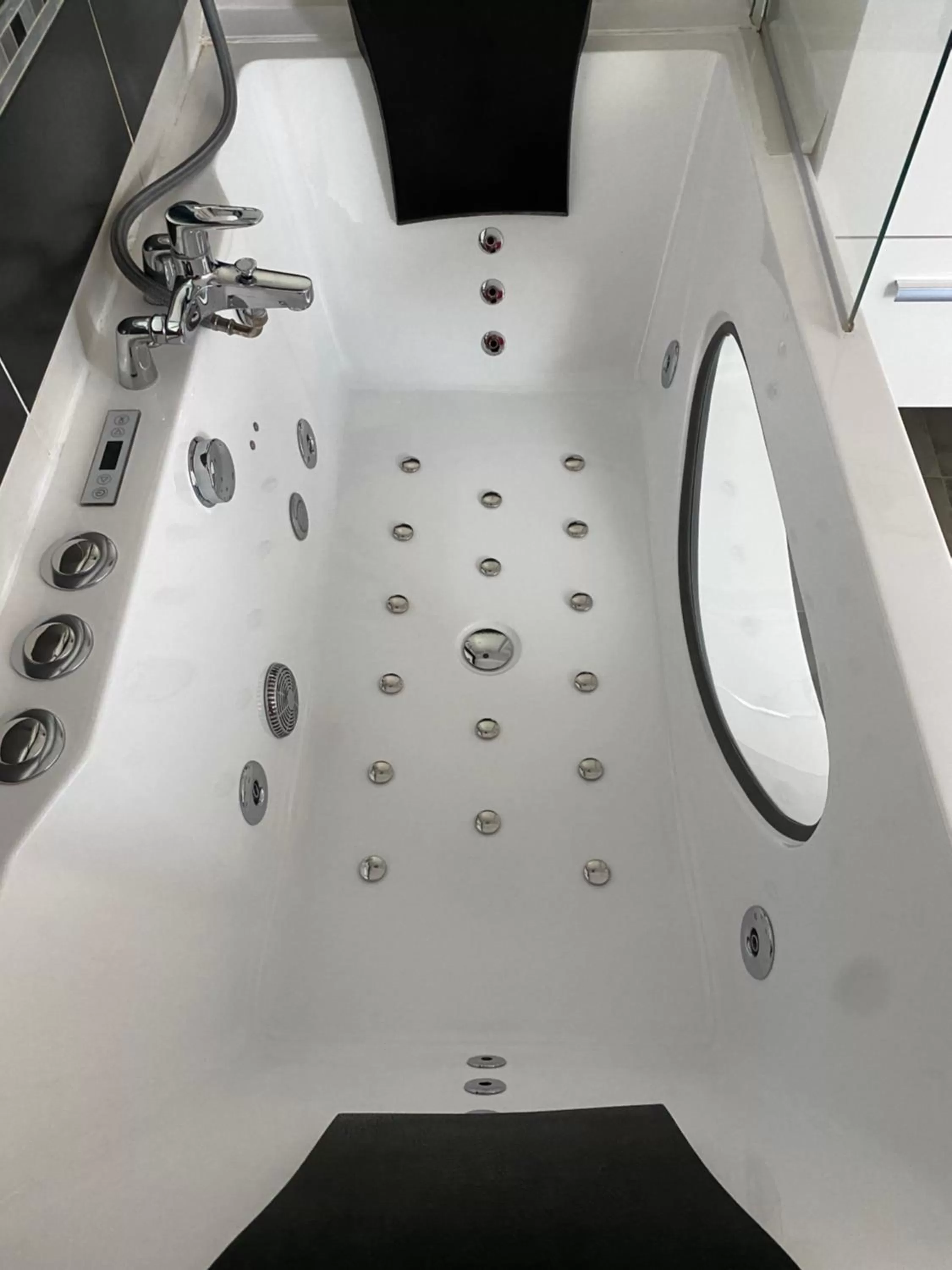 Bathroom in Chambres d'Hôtes Au coin du spa