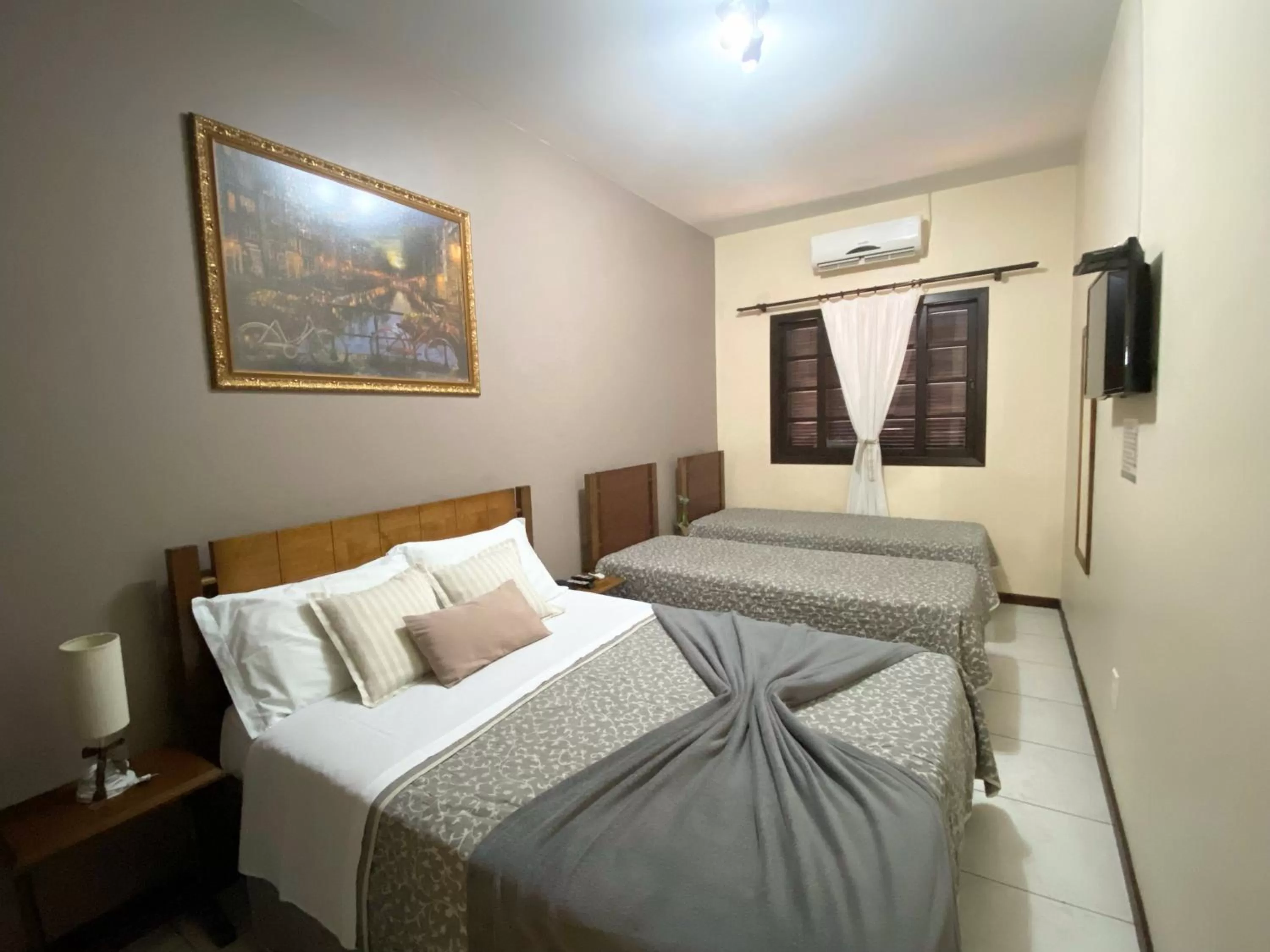 Bed in Pousada Canasvieiras