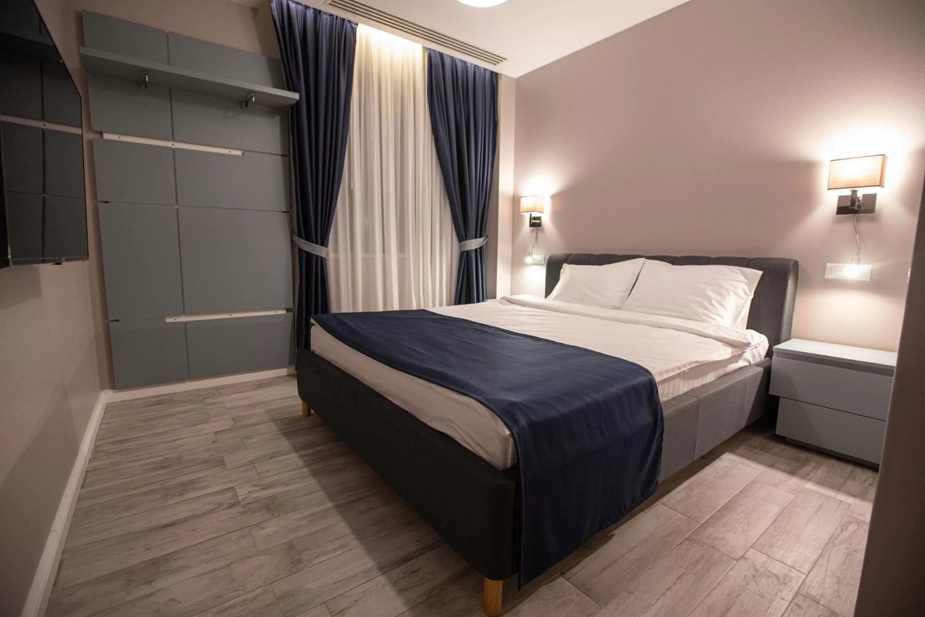 Bedroom in Omnia Apartments