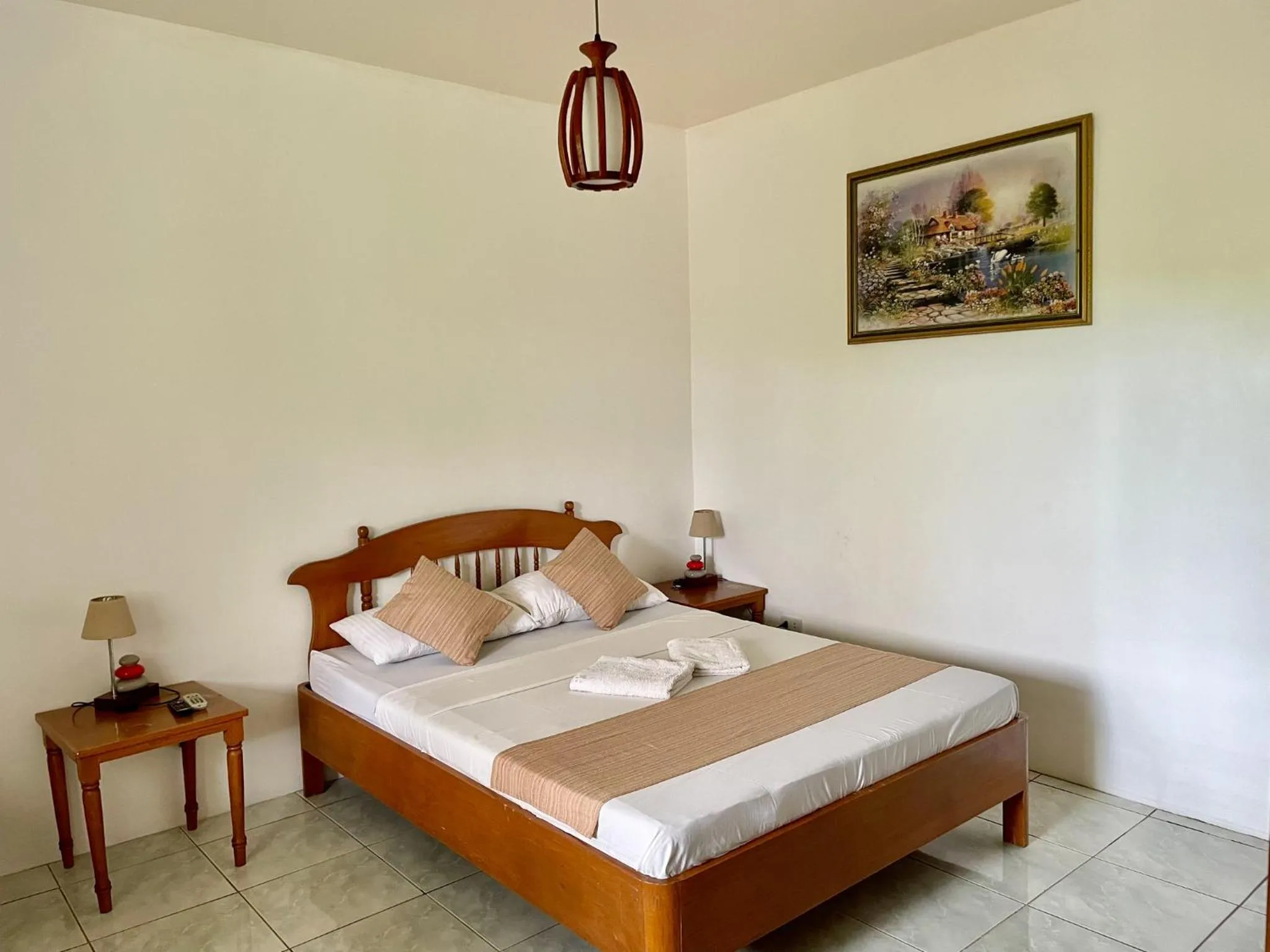 Bedroom, Bed in Lapu-Lapu Cottages & Restaurant