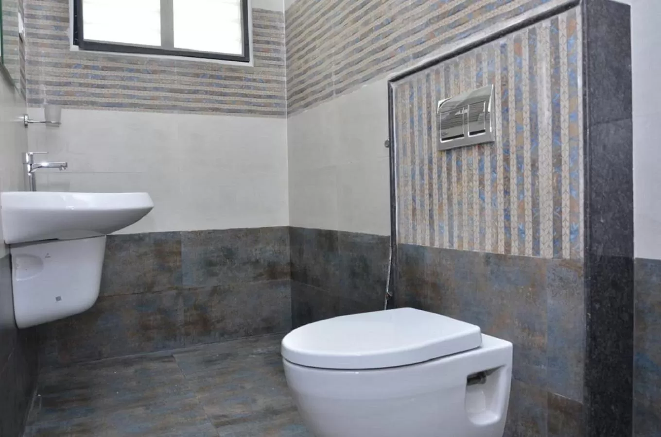 Bathroom in THE SURRYA MAX RESIDENCY